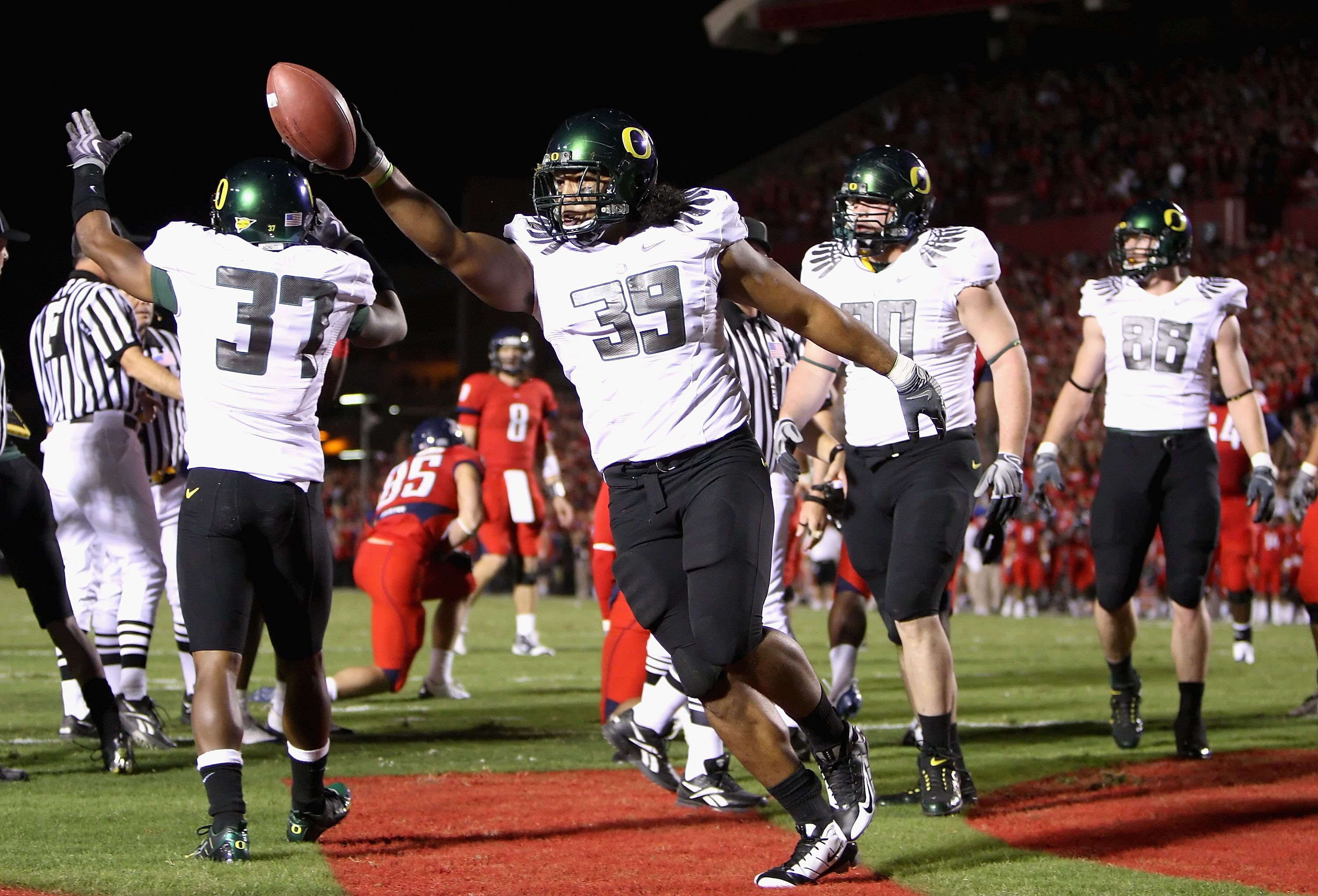 TUCSON, AZ - NOVEMBER 21:  Defensive end Will Tukuafu #39 of the Oregon Ducks celebrates after recovering a fumble in the endzone during the college football game against the Arizona Wildcats at Arizona Stadium on November 21, 2009 in Tucson, Arizona. The