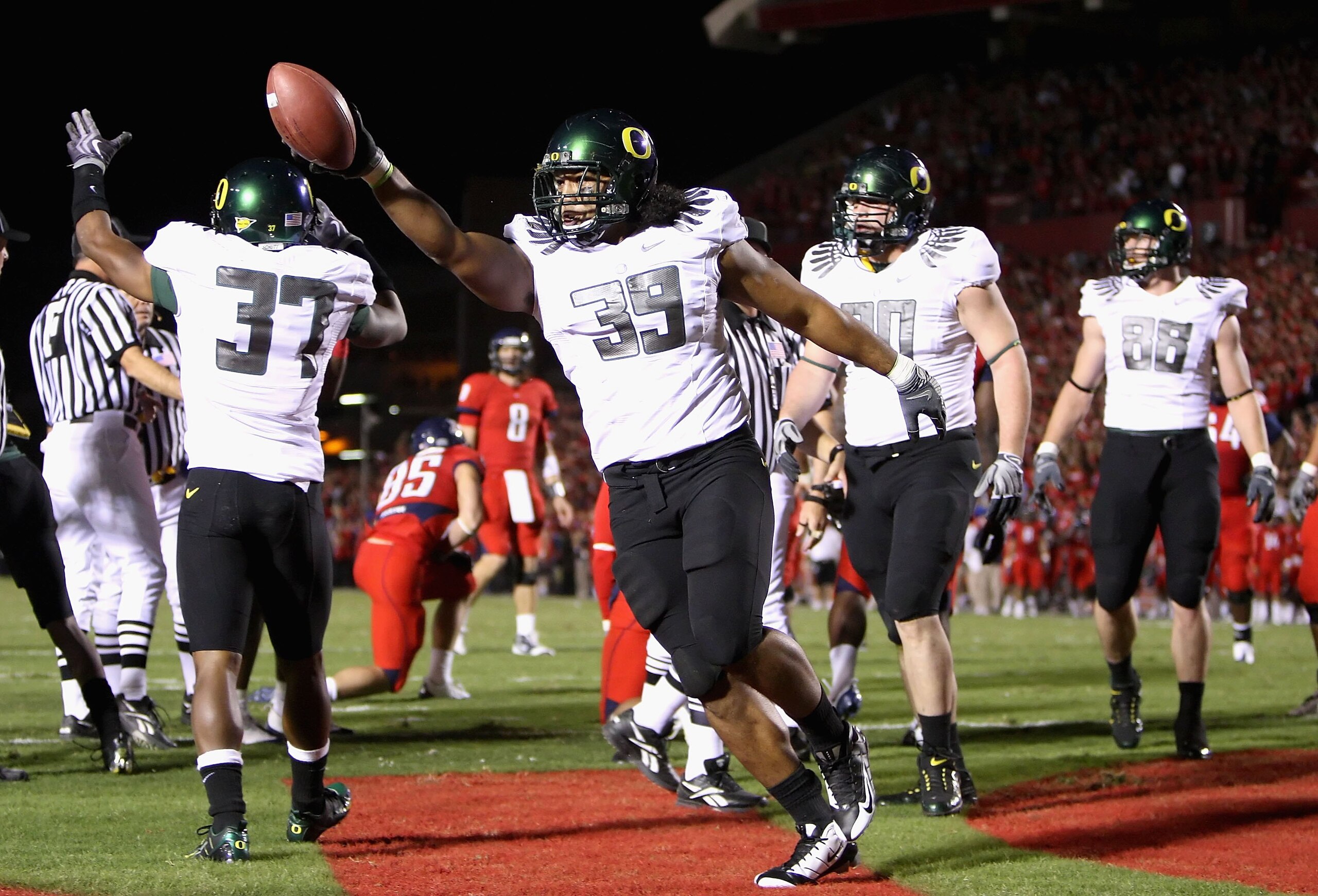 TUCSON, AZ - NOVEMBER 21:  Defensive end Will Tukuafu #39 of the Oregon Ducks celebrates after recovering a fumble in the endzone during the college football game against the Arizona Wildcats at Arizona Stadium on November 21, 2009 in Tucson, Arizona. The