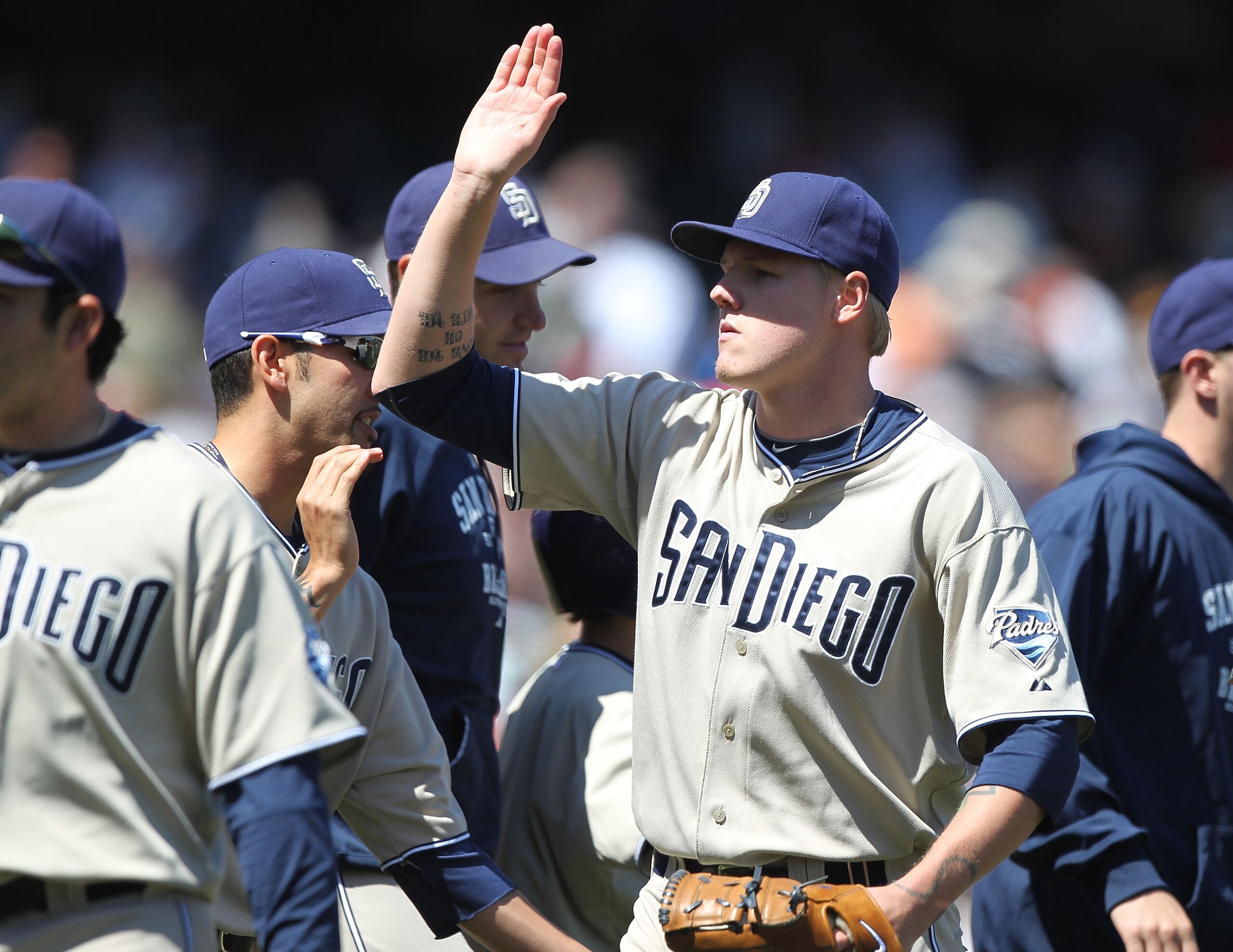 SAN FRANCISCO - MAY 13:  Mat Latos #38 of the San Diego Padres celebrates after defeating the San Francisco Giants during an MLB game at AT&T Park on May 13, 2010 in San Francisco, California.  (Photo by Jed Jacobsohn/Getty Images)