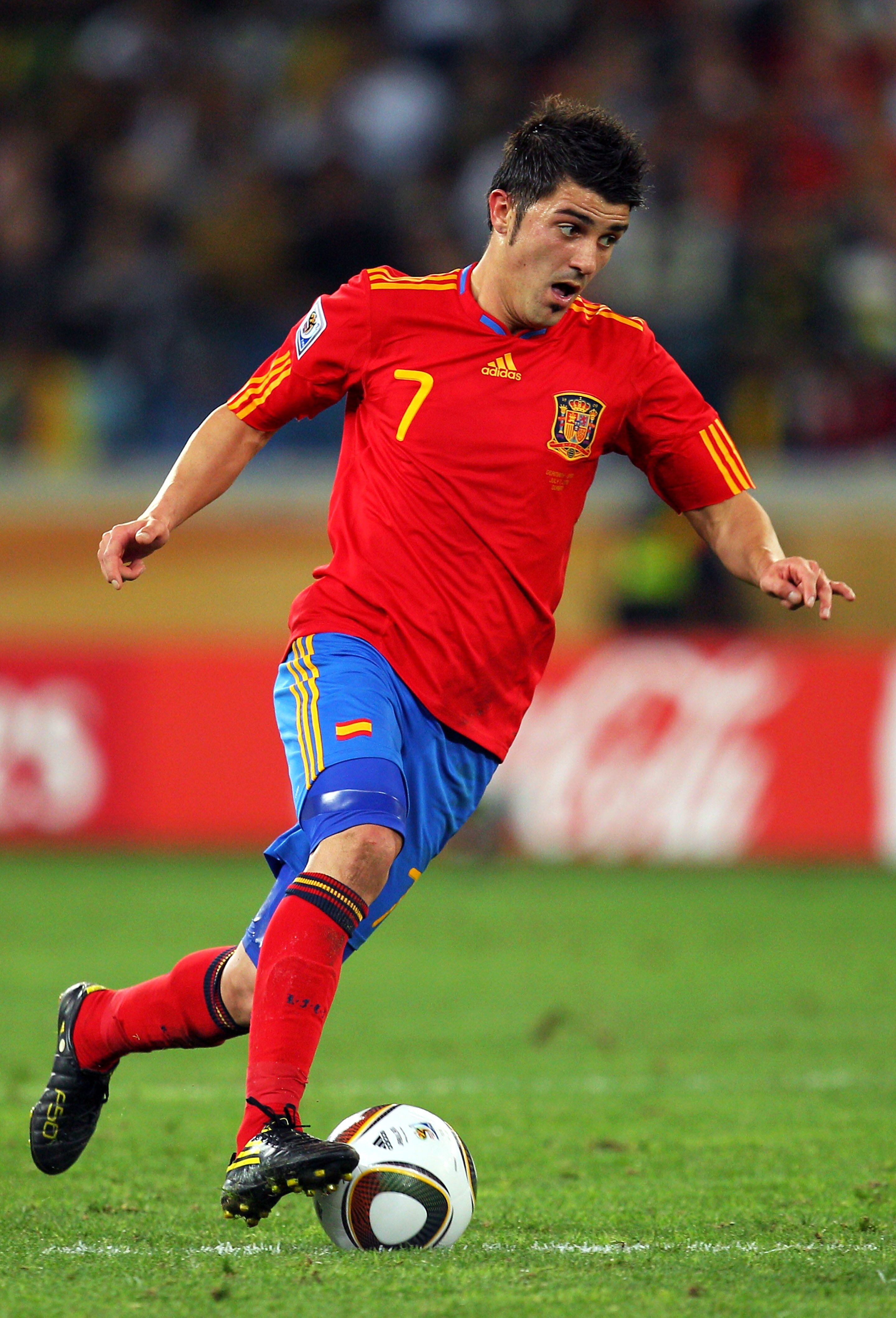 DURBAN, SOUTH AFRICA - JULY 07:  David Villa of Spain runs with the ball during the 2010 FIFA World Cup South Africa Semi Final match between Germany and Spain at Durban Stadium on July 7, 2010 in Durban, South Africa.  (Photo by Cameron Spencer/Getty Ima