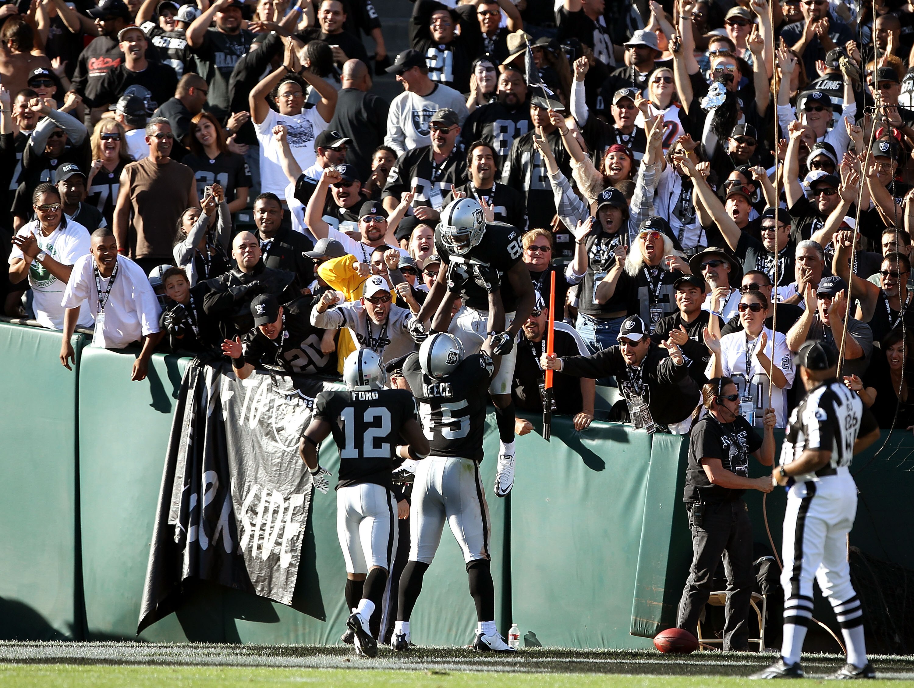 OAKLAND, CA - OCTOBER 31:  Darrius Heyward-Bey #85 of the Oakland Raiders is lifted in the air by Marcel Reece #45 after he ran in for a touchdown against the Seattle Seahawks at Oakland-Alameda County Coliseum on October 31, 2010 in Oakland, California. 