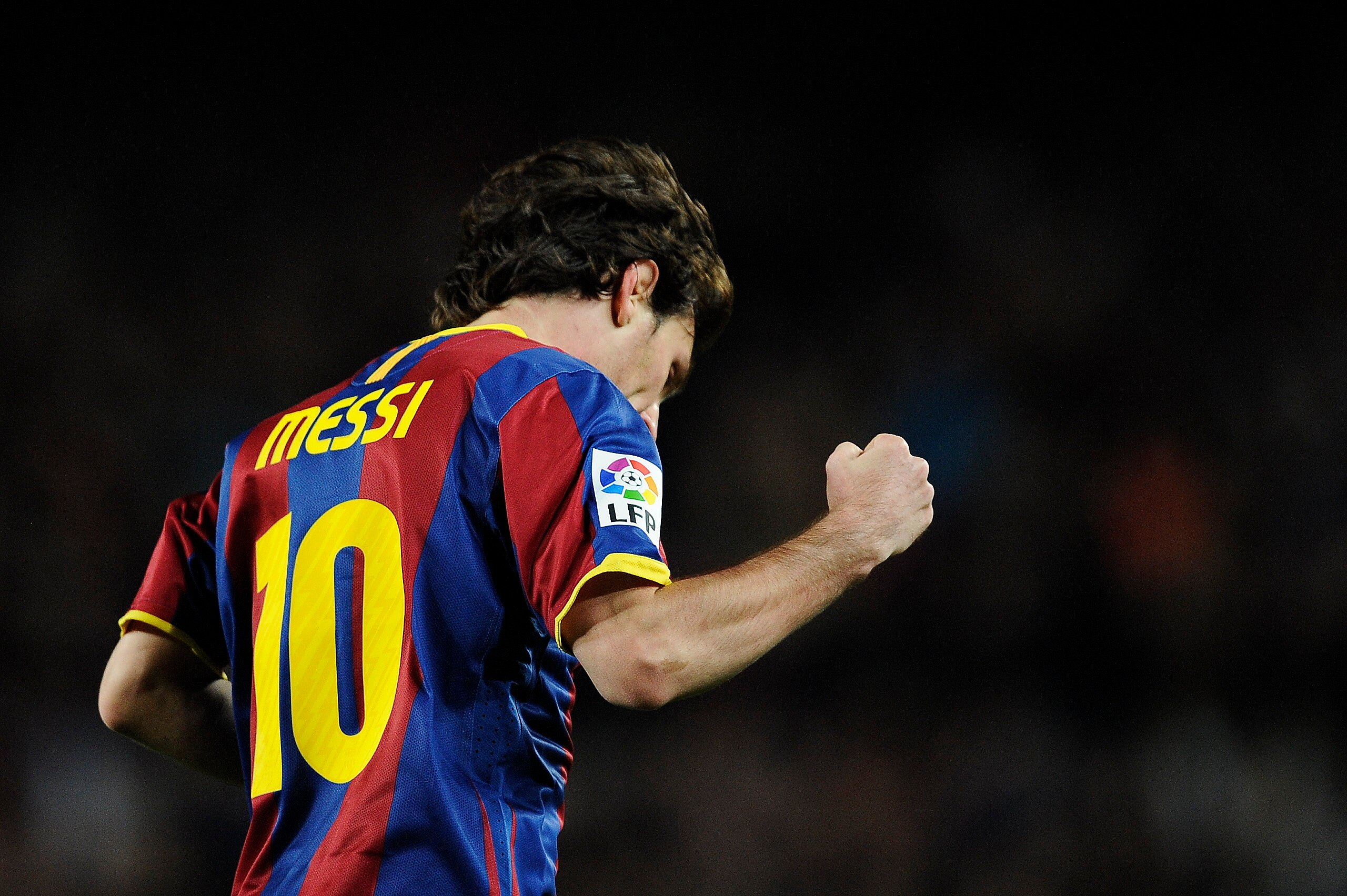 BARCELONA, SPAIN - OCTOBER 30:  Lionel Messi of Barcelona celebrates after scoring his second goal during the La Liga match between Barcelona and Sevilla FC on October 30, 2010 in Barcelona, Spain. Barcelona won the match 5-0.  (Photo by David Ramos/Getty