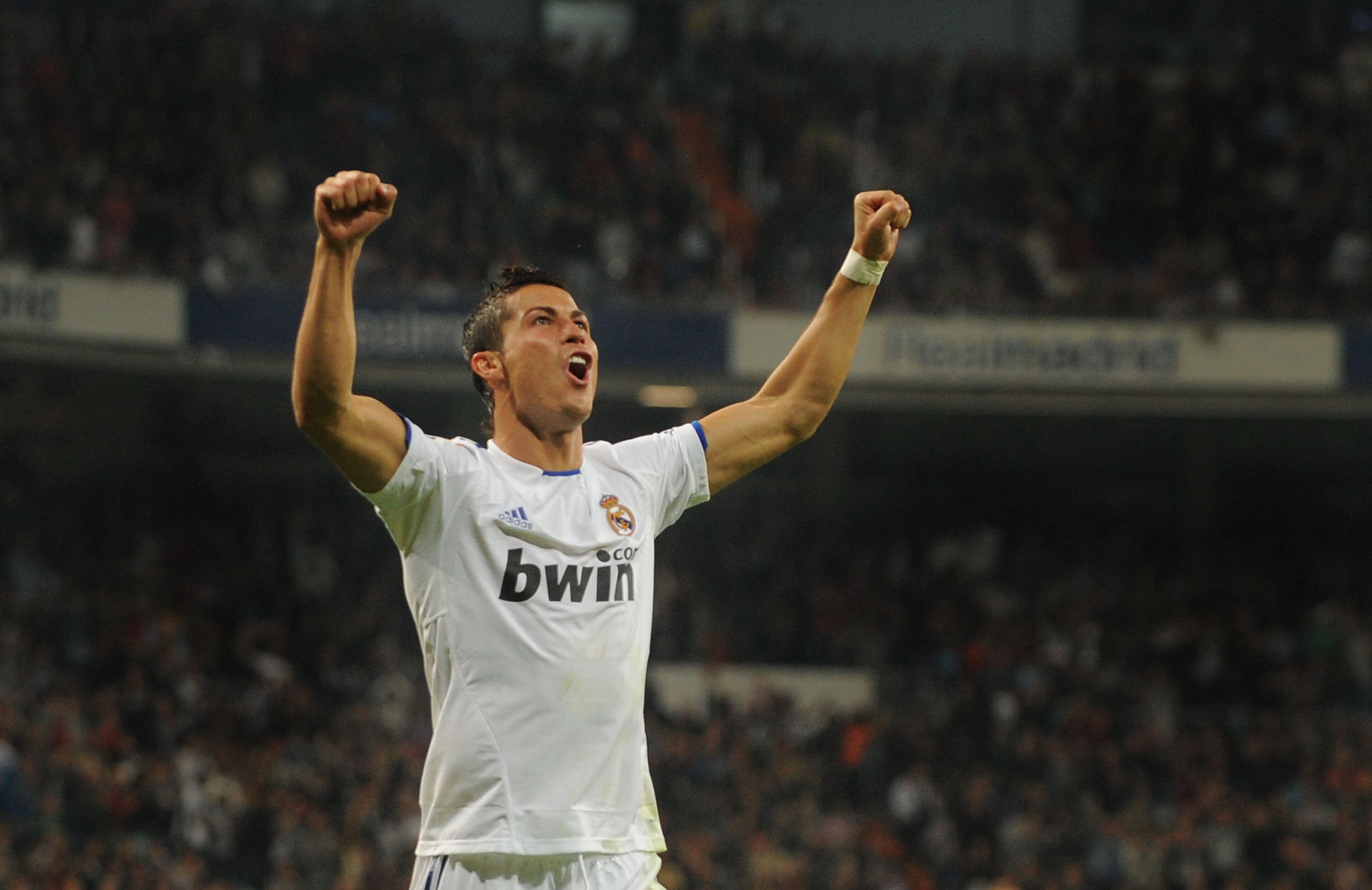 MADRID, SPAIN - OCTOBER 23:  Cristiano Ronaldo of Real Madrid celebrates after scoring Real's 4th goal during the La Liga match between Real Madrid and Racing Santander at Estadio Santiago Bernabeu on October 23, 2010 in Madrid, Spain.  (Photo by Denis Do