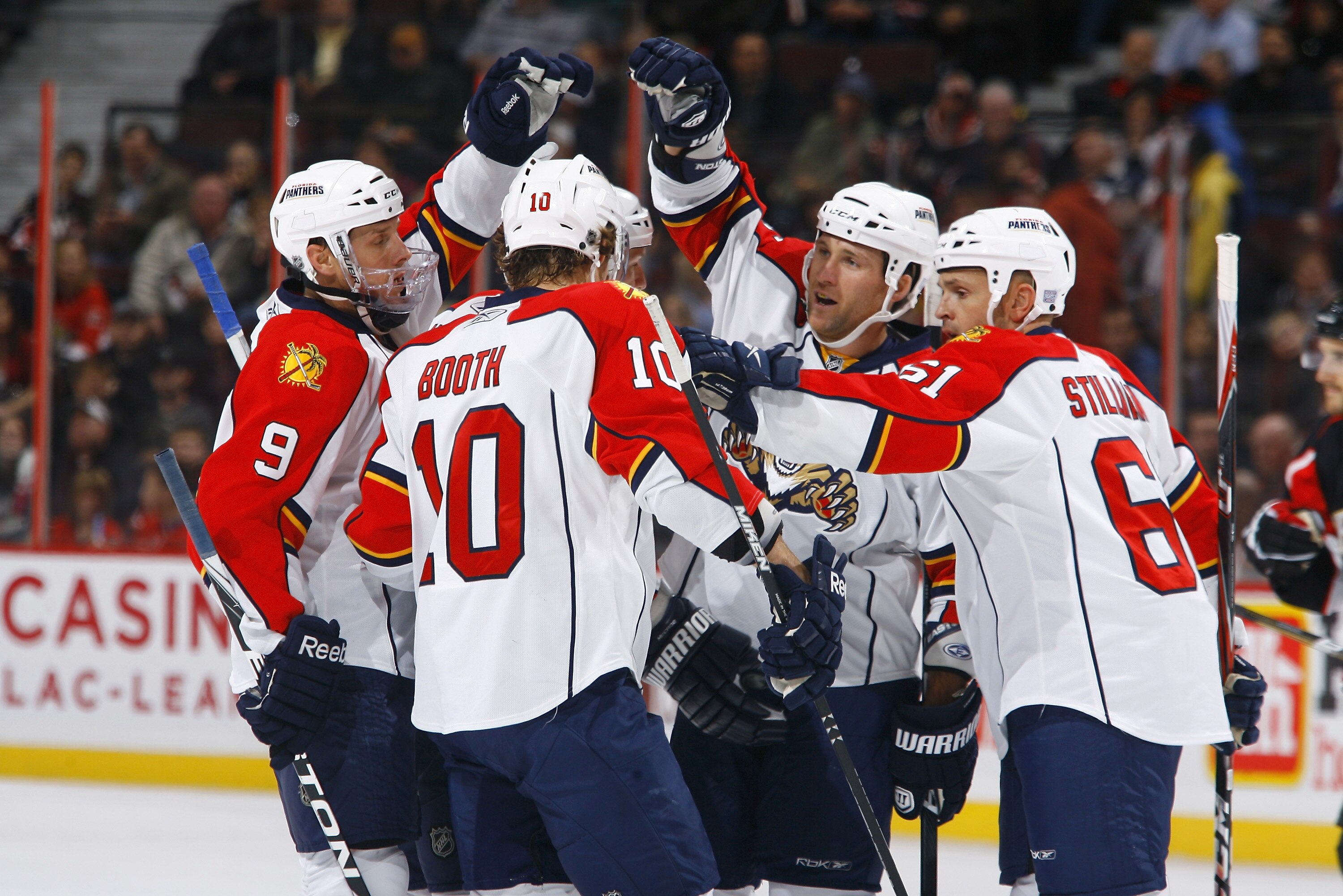 OTTAWA, ON - OCTOBER 28:  Bryan McCabe #24 of the Florida Panthers celebrates his goal against the Ottawa Senators with teammates Stephen Weiss #9, David Booth #10 and Cory Stillman #61 at Scotiabank Place on October 28, 2010 in Ottawa, Ontario, Canada.