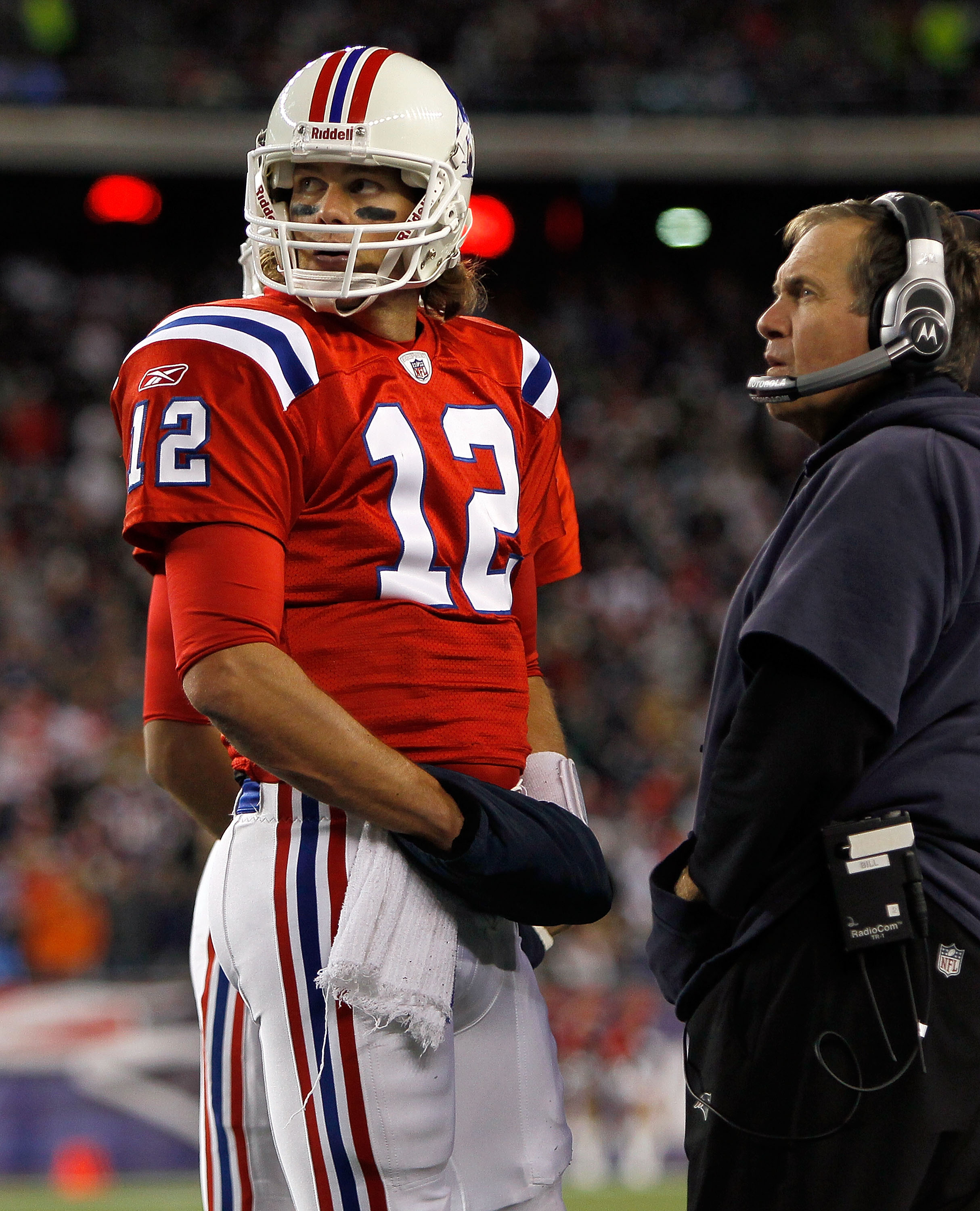 FOXBORO, MA - OCTOBER 31:  Tom Brady #12 of New England Patriots checks the clock with his coach Bill Belichick in the fourth quarter against the Minnesita Vikings at Gillette Stadium on October 31, 2010 in Foxboro, Massachusetts. (Photo by Jim Rogash/Get