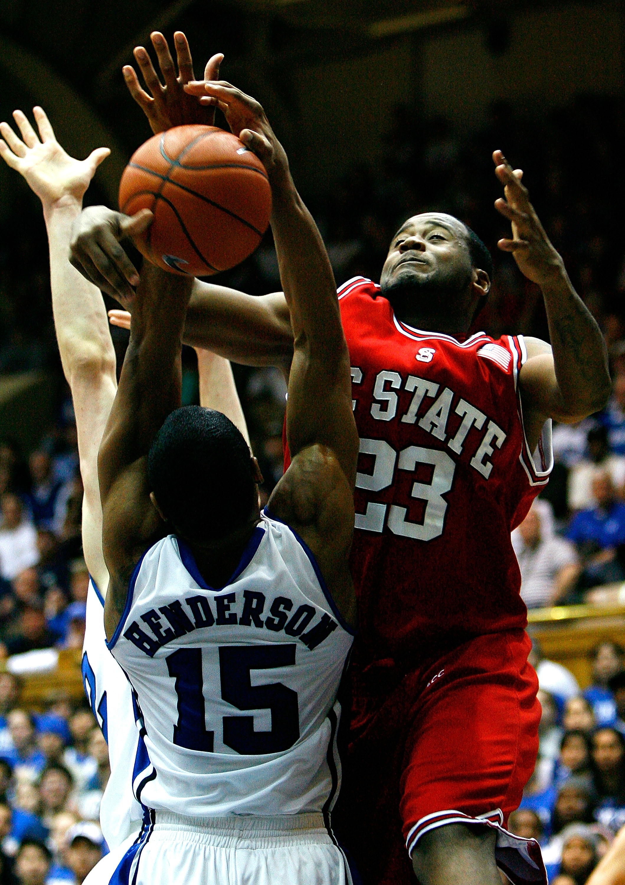 DURHAM, NC - JANUARY 20:  Tracy Smith #23 of the North Carolina State Wolfpack draws a foul from Gerald Henderson #15 of the Duke Blue Devils during the game on January 20, 2009 at Cameron Indoor Stadium in Durham, North Carolina.  (Photo by Kevin C. Cox/