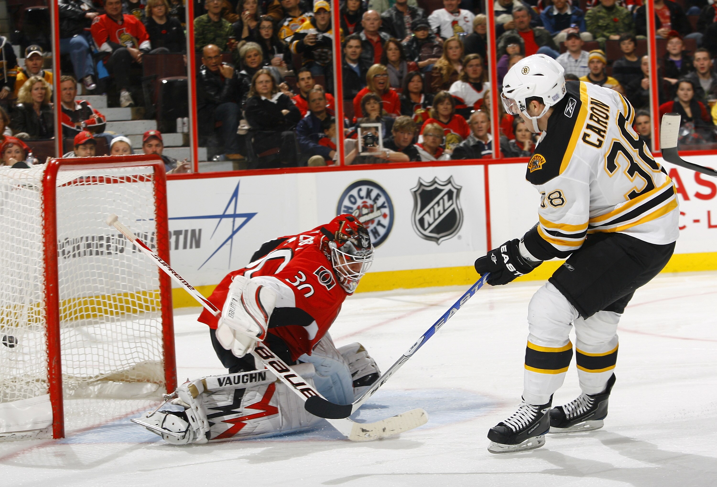 OTTAWA, ON - OCTOBER 30:  Jordan Carron #38 of the Boston Bruins scores a breakaway goal on Brian Elliott #30 of the Ottawa Senators during a game at Scotiabank Place on October 30, 2010 in Ottawa, Ontario, Canada.  The Boston Bruins defeated the Ottawa S
