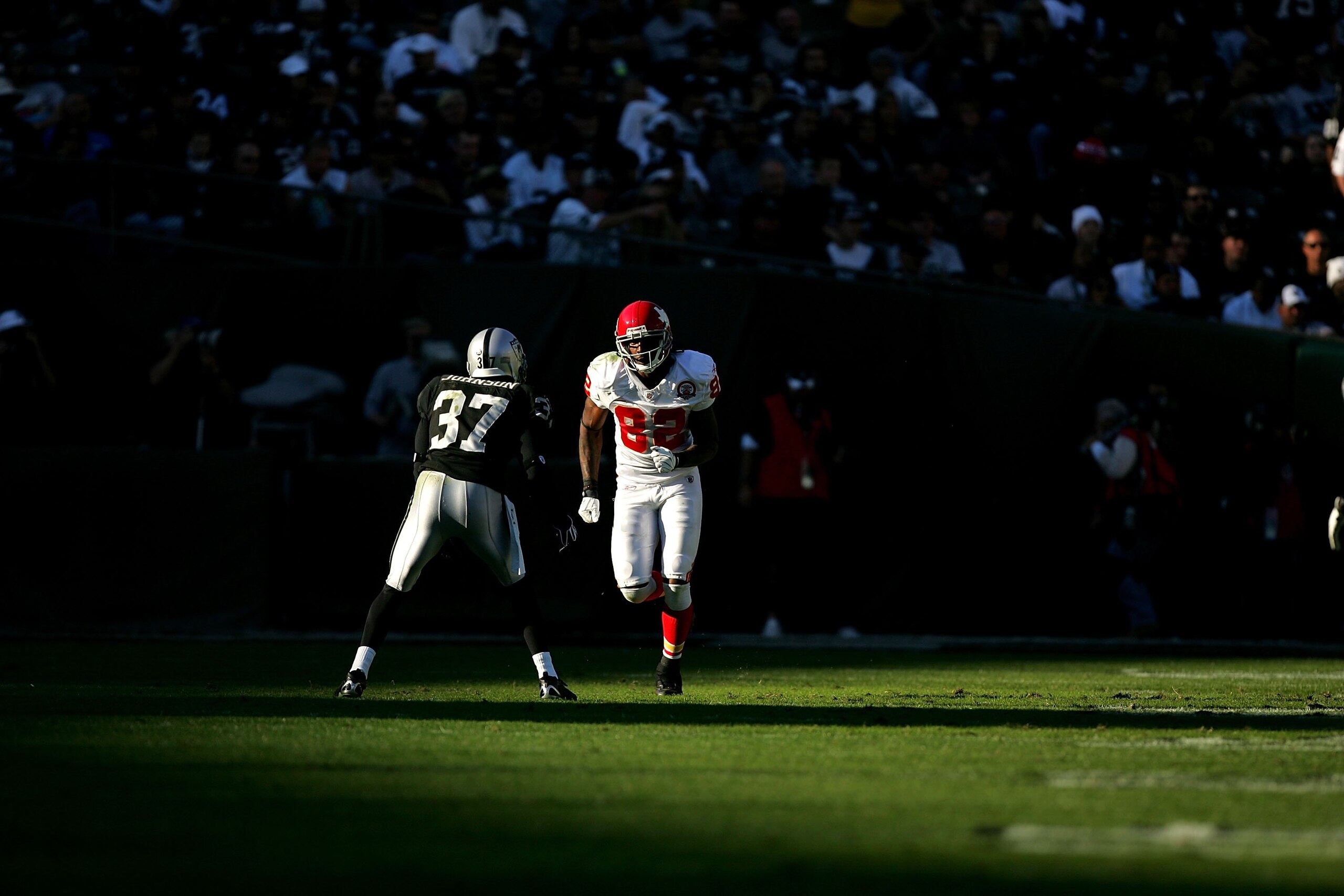 OAKLAND, CA - NOVEMBER 15: Dwayne Bowe #82 of the Kansas City Chiefs lines up against Chris Johnson #37 of the Oakland Raiders at Oakland-Alameda County Coliseum on November 15, 2009 in Oakland, California.  (Photo by Ezra Shaw/Getty Images)