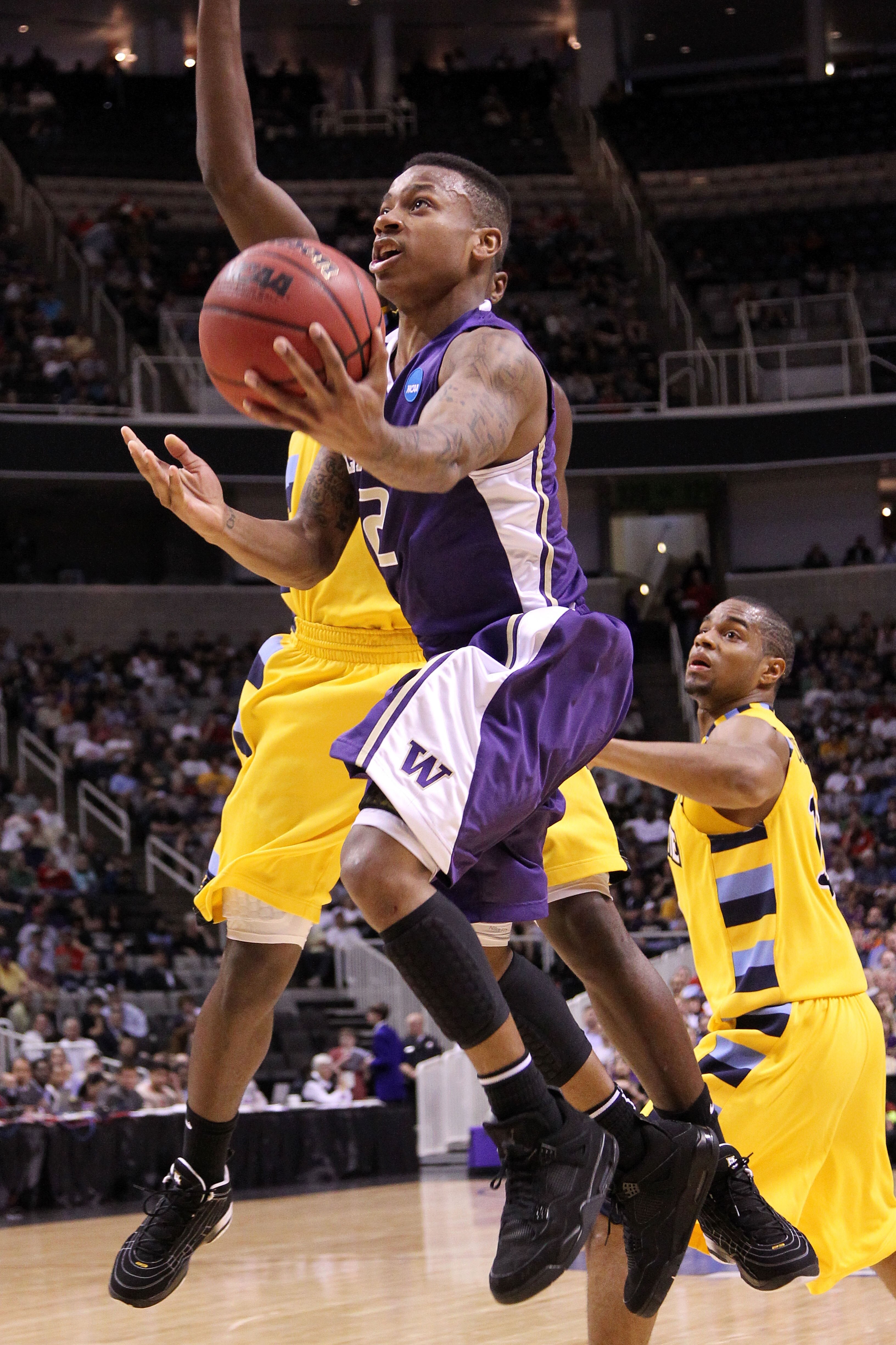SAN JOSE, CA - MARCH 18:  Isaiah Thomas #2 of the Washington Huskies takes a shot against the Marquette Golden Eagles during the first round of the 2010 NCAA men's basketball tournament at HP Pavilion on March 18, 2010 in San Jose, California.  (Photo by