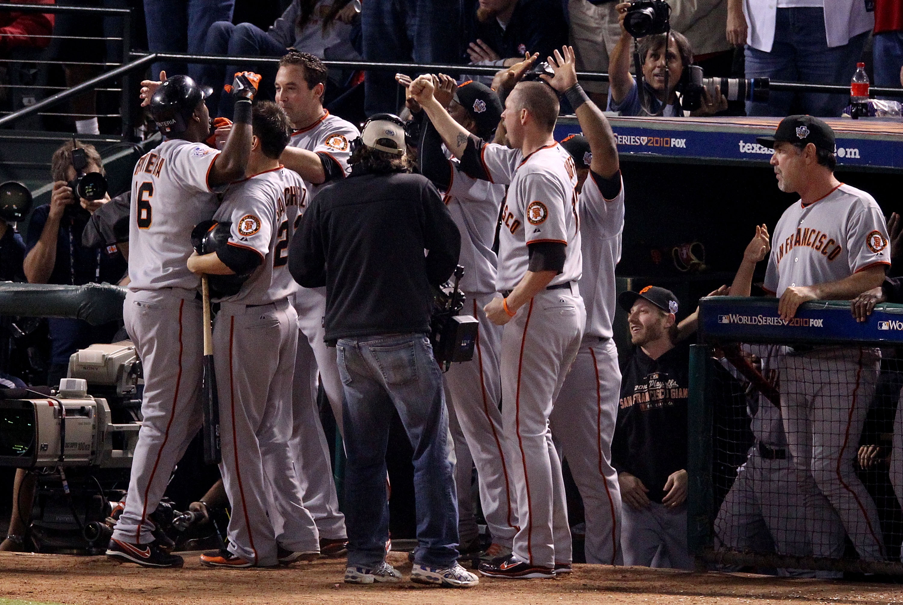 ARLINGTON, TX - NOVEMBER 01:  Edgar Renteria #16 of the San Francisco Giants celebrates with teammates after hitting a 3-run homer to centerfield against the Texas Rangers in the top of the seventh inning of Game Five of the 2010 MLB World Series at Range