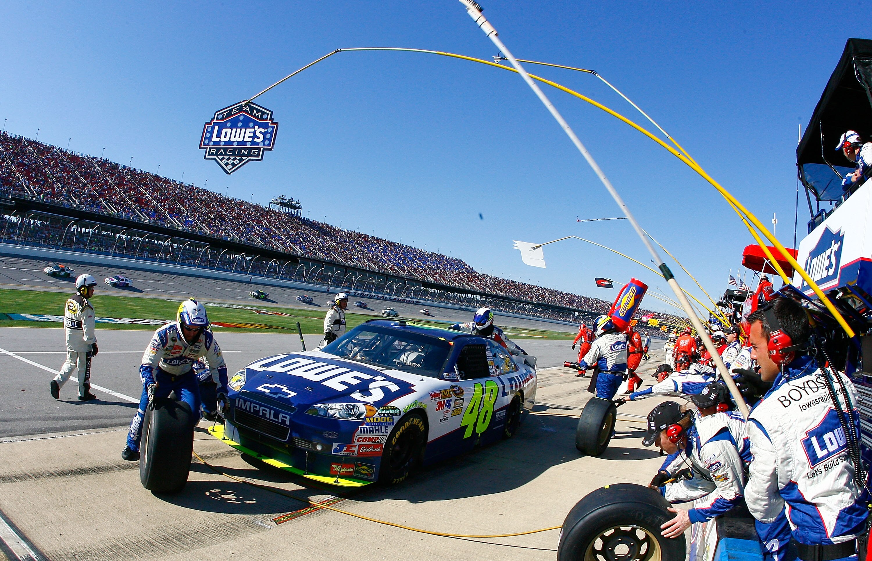 TALLADEGA, AL - OCTOBER 31:  Jimmie Johnson, driver of the #48 Lowe's Chevrolet, pits during the NASCAR Sprint Cup Series AMP Energy Juice 500 at Talladega Superspeedway on October 31, 2010 in Talladega, Alabama.  (Photo by Jason Smith/Getty Images for NA