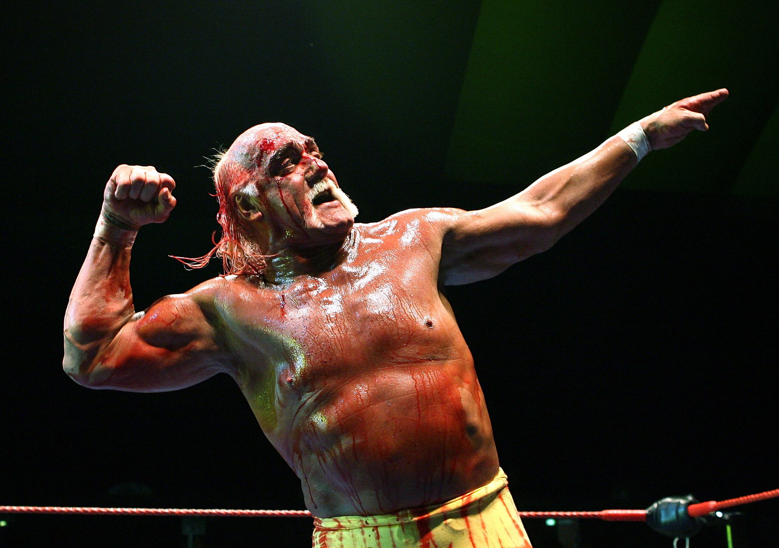 PERTH, AUSTRALIA - NOVEMBER 24:  Hulk Hogan gestures to the audience during his Hulkamania Tour at the Burswood Dome on November 24, 2009 in Perth, Australia.  (Photo by Paul Kane/Getty Images)