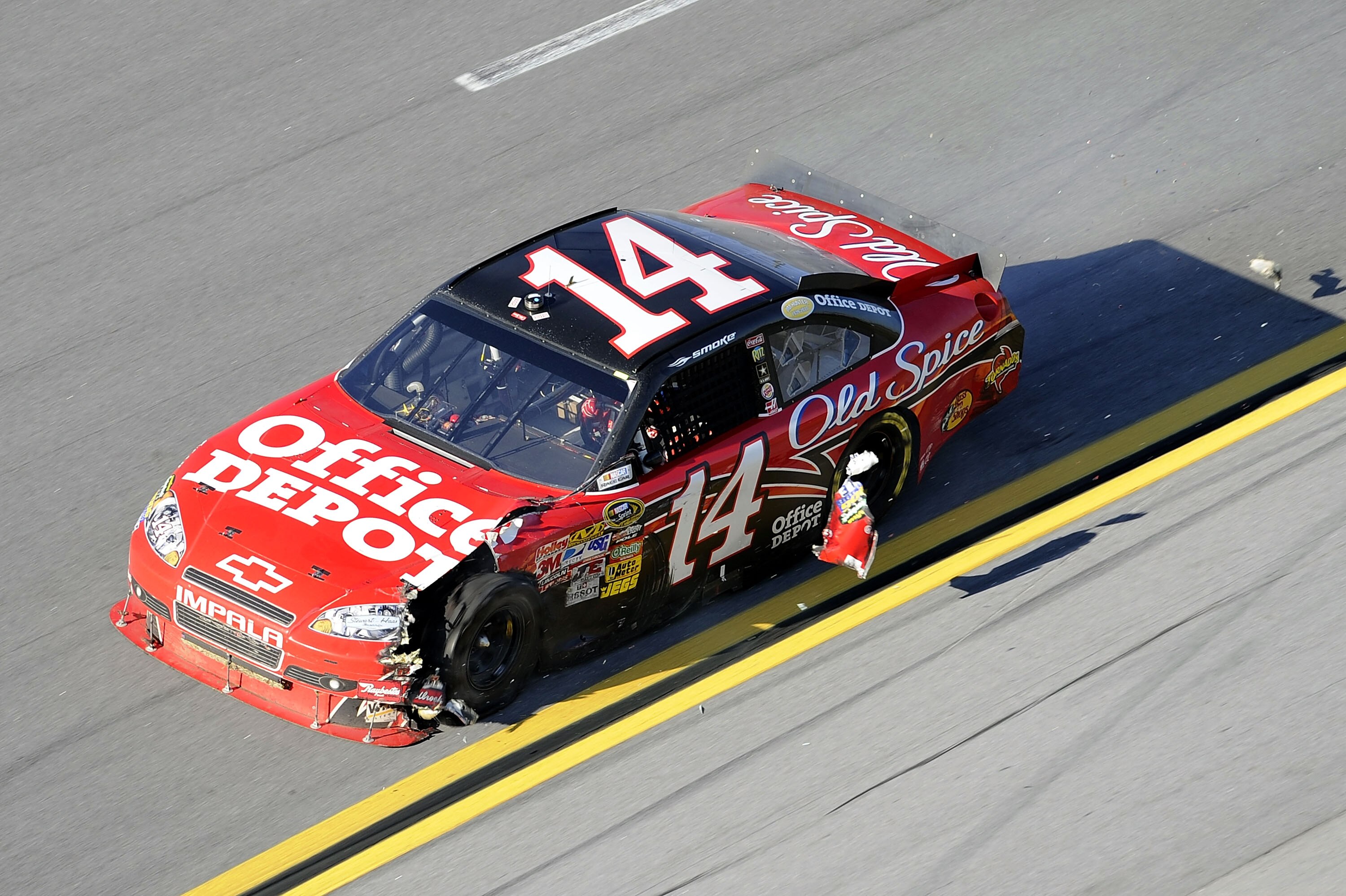 TALLADEGA, AL - OCTOBER 31:  Tony Stewart drives the wrecked #14 Old Spice/Office Depot Chevrolet during the NASCAR Sprint Cup Series AMP Energy Juice 500 at Talladega Superspeedway on October 31, 2010 in Talladega, Alabama.  (Photo by John Harrelson/Gett