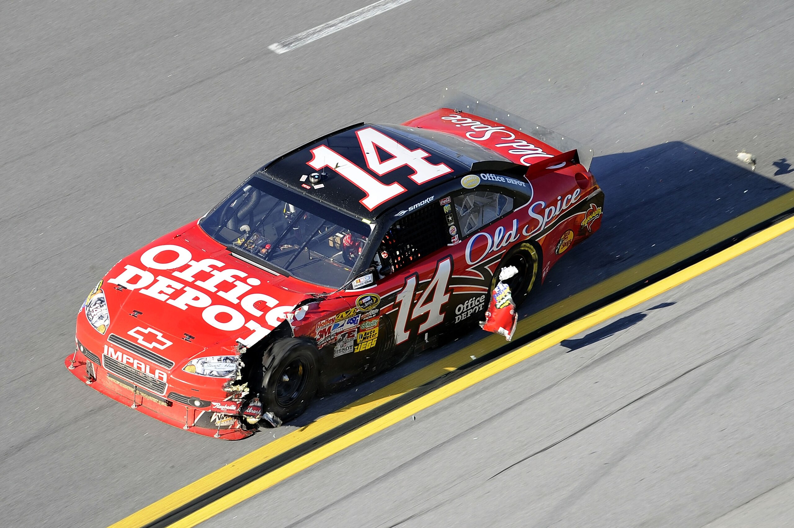 TALLADEGA, AL - OCTOBER 31:  Tony Stewart drives the wrecked #14 Old Spice/Office Depot Chevrolet during the NASCAR Sprint Cup Series AMP Energy Juice 500 at Talladega Superspeedway on October 31, 2010 in Talladega, Alabama.  (Photo by John Harrelson/Gett