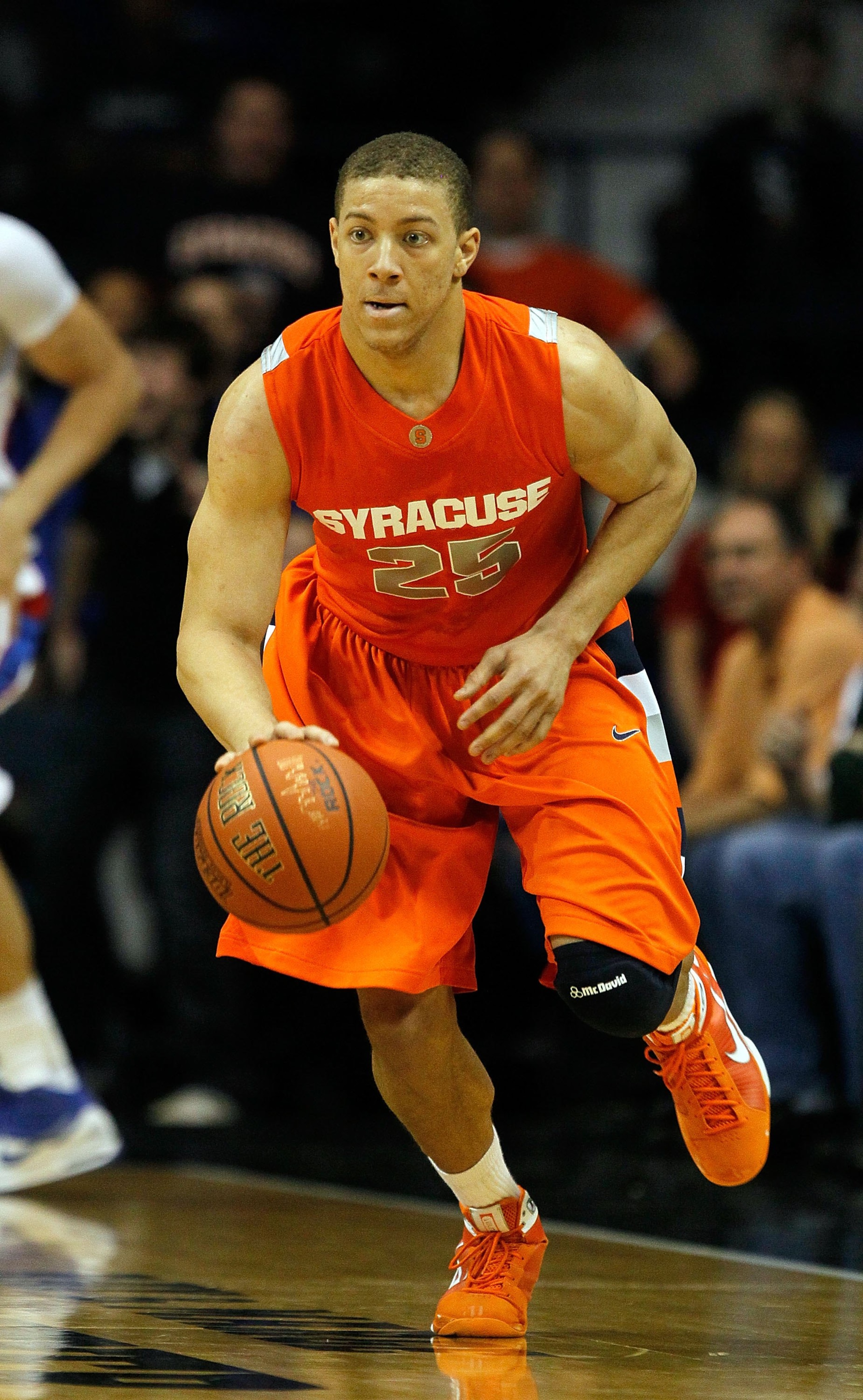 ROSEMONT, IL - JANUARY 30: Brandon Triche #25 of the Syracuse Orange brings the ball up court against the DePaul Blue Demons at the Allstate Arena on January 30, 2010 in Rosemont, Illinois. Syracuse defeated DePaul 59-57. (Photo by Jonathan Daniel/Getty I