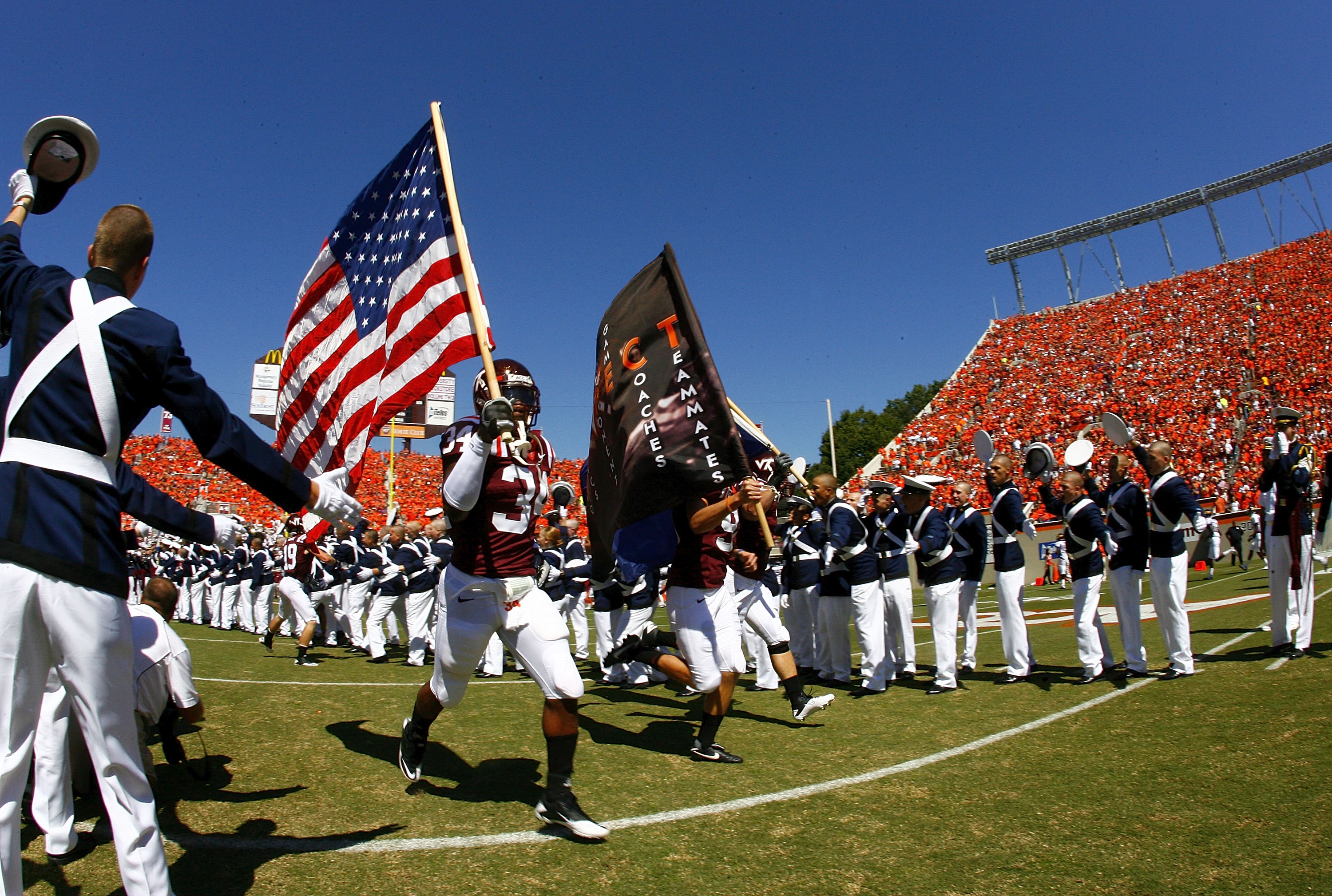 BLACKSBURG, VA - SEPTEMBER 18: Virginia Tech Hokies players take the field prior to the Hokies game against the East Carolina Pirates at Lane Stadium on September 18, 2010 in Blacksburg, Virginia.  (Photo by Geoff Burke/Getty Images)