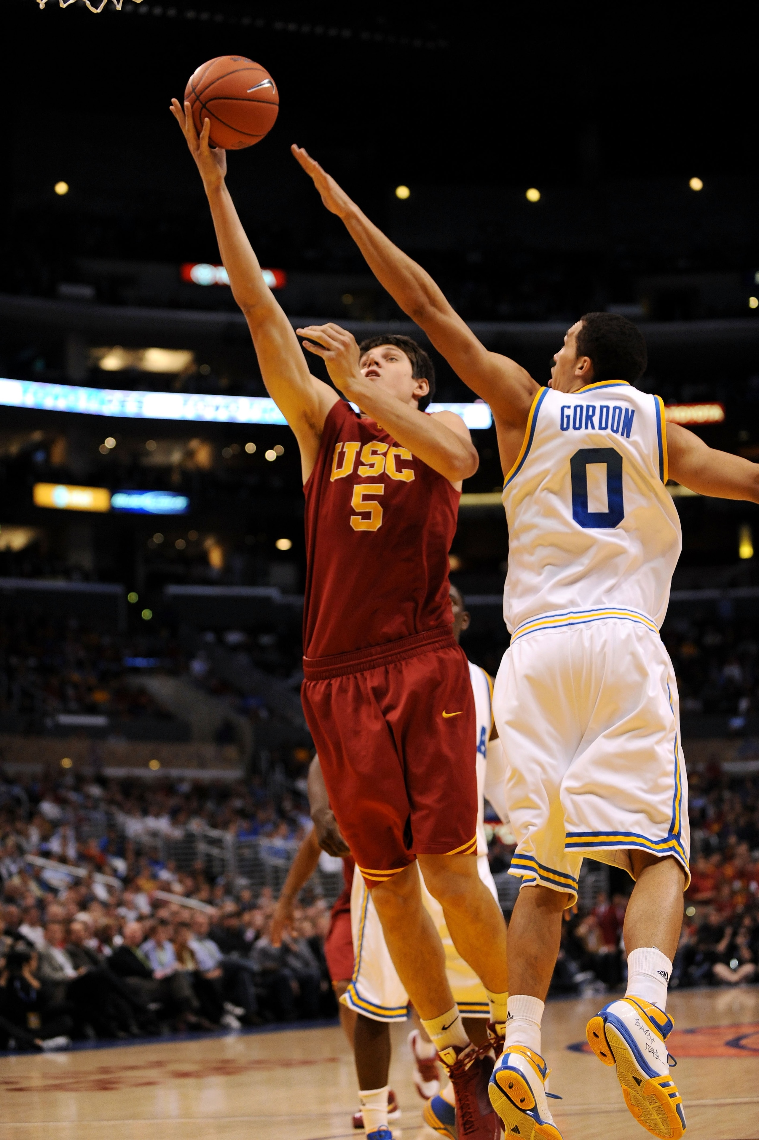 LOS ANGELES, CA - MARCH 13:  Nikola Vucevic #5 of the USC Trojans goes for a layup against the UCLA Bruins in the Pacific Life Pac-10 Men's Basketball Tournament at the Staples Center on March 13, 2009 in Los Angeles, California.  (Photo by Harry How/Gett
