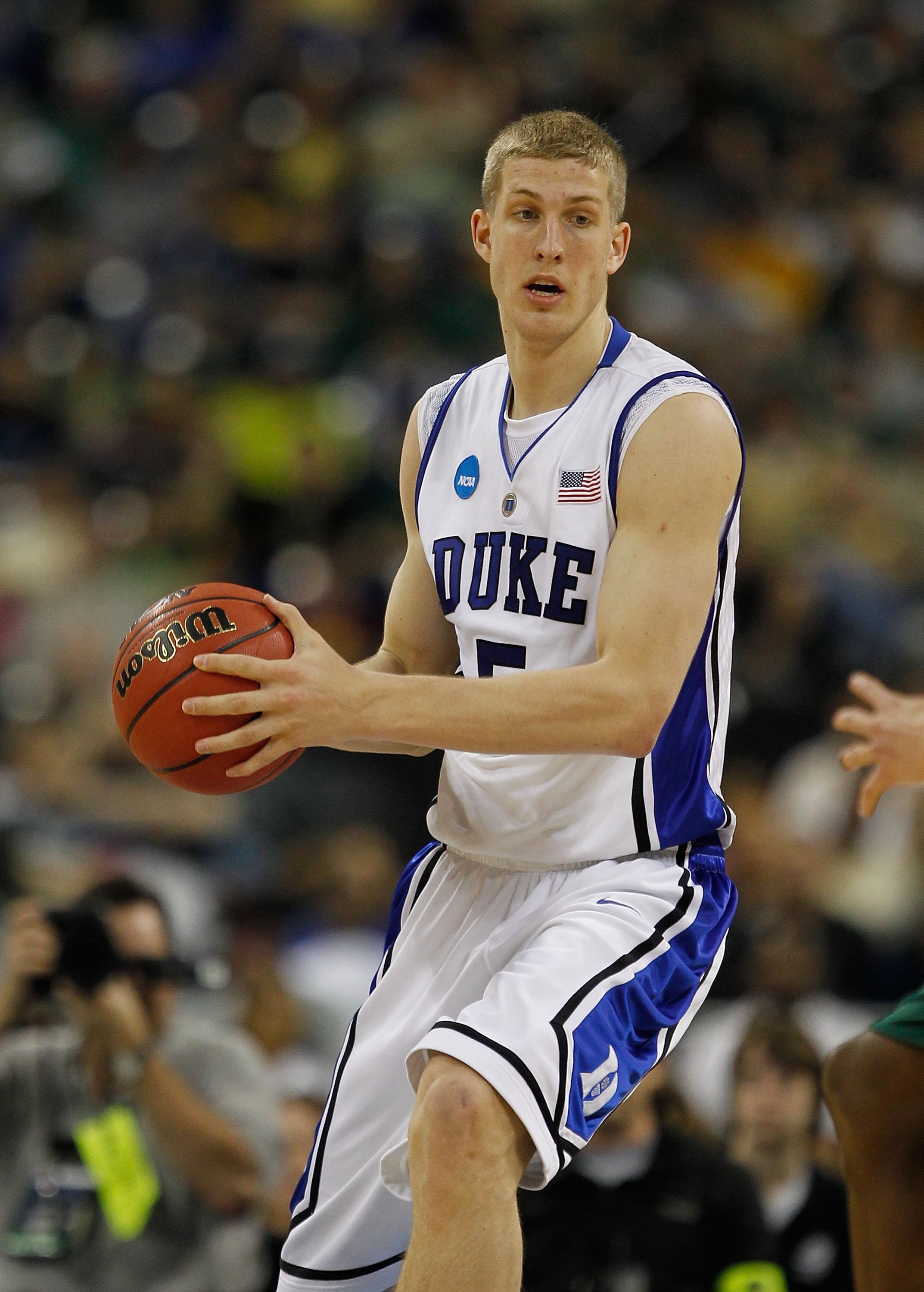 HOUSTON - MARCH 28: Mason Plumlee #5 of the Duke Blue Devils looks to pass against the Baylor Bears during the south regional final of the 2010 NCAA men's basketball tournament at Reliant Stadium on March 28, 2010 in Houston, Texas. Duke defeated Baylor 7