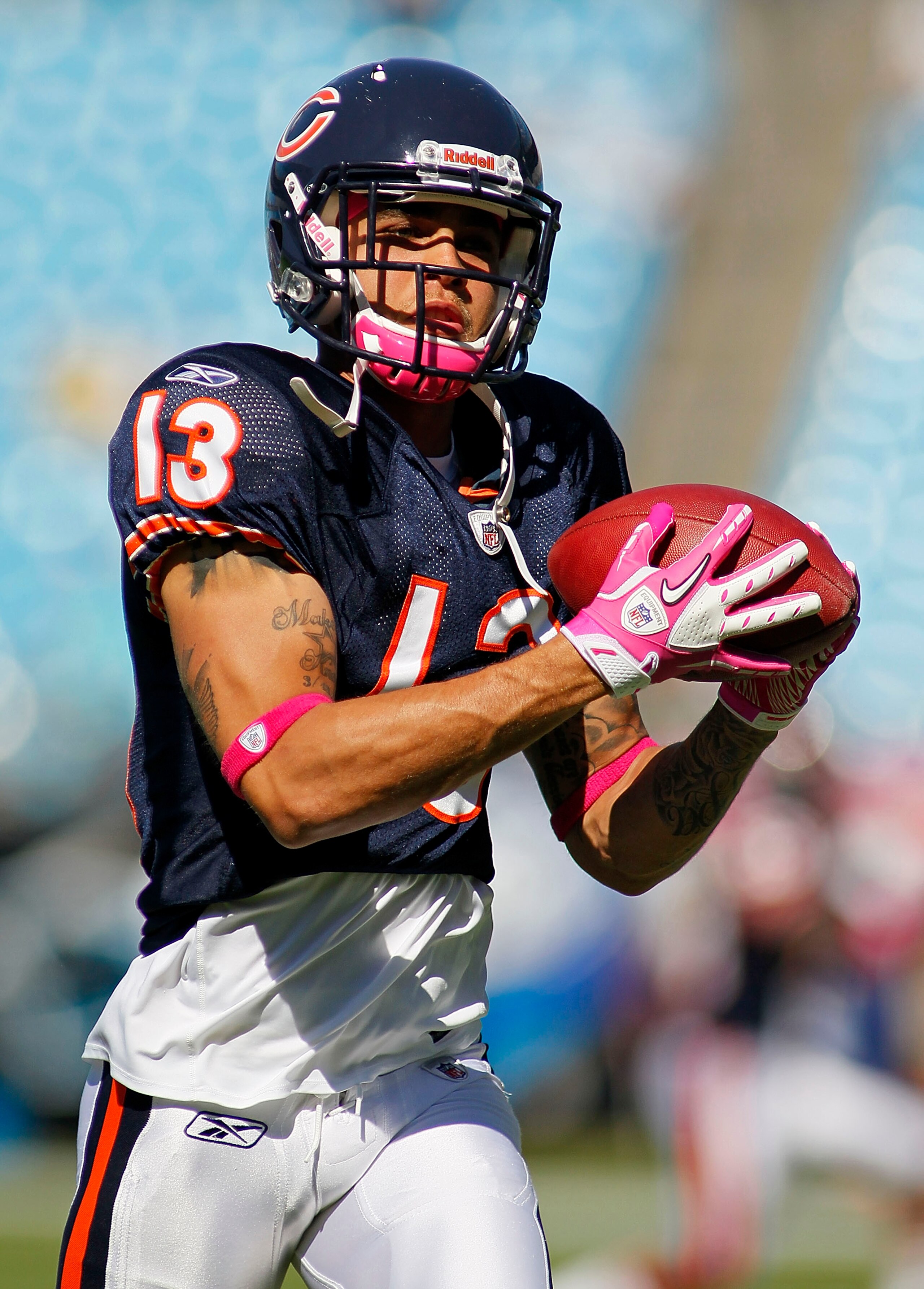 CHARLOTTE, NC - OCTOBER 10: Wide receiver Johnny Knox #13 of the Chicago Bears catches the ball during warm ups prior to the Bears game against the Carolina Panthers at Bank of America Stadium on October 10, 2010 in Charlotte, North Carolina. (Photo by Ge
