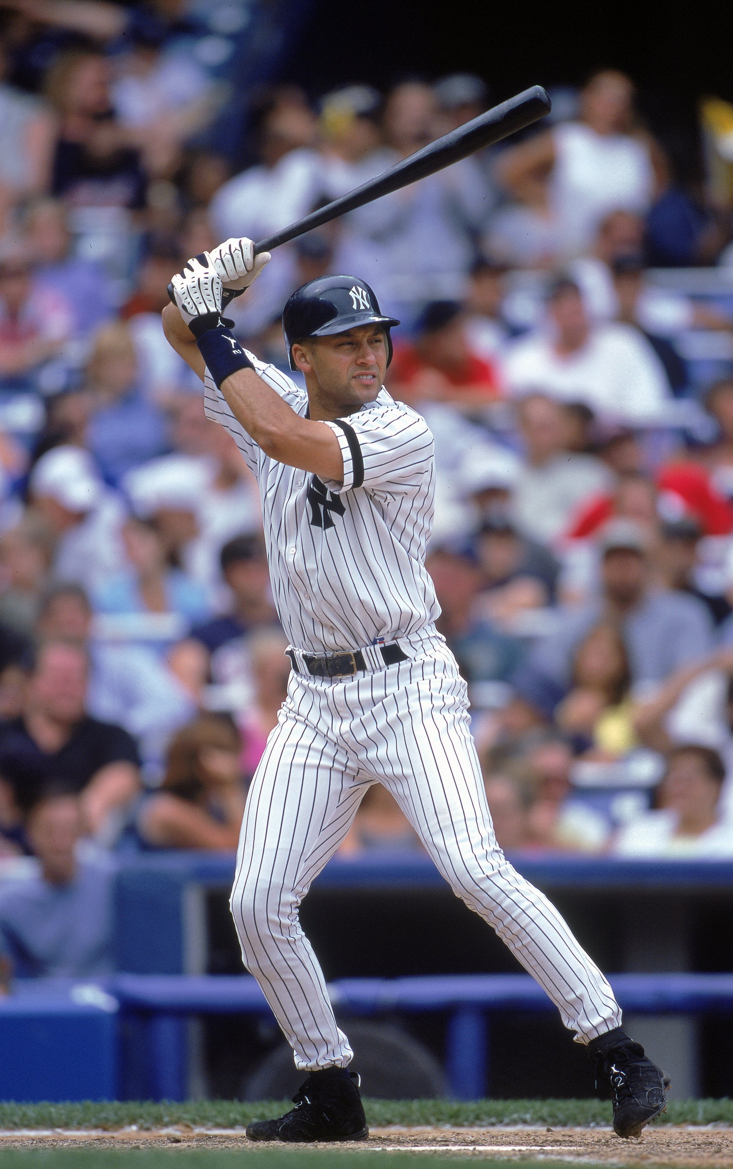 6 Aug 2000:  Derek Jeter #2 of the New York Yankees at bat during the game against the Seattle Mariners at Yankee Stadium in the Bronx, New York. The Mariners defeated the Yankees 11-1.Mandatory Credit: Jamie Squire  /Allsport