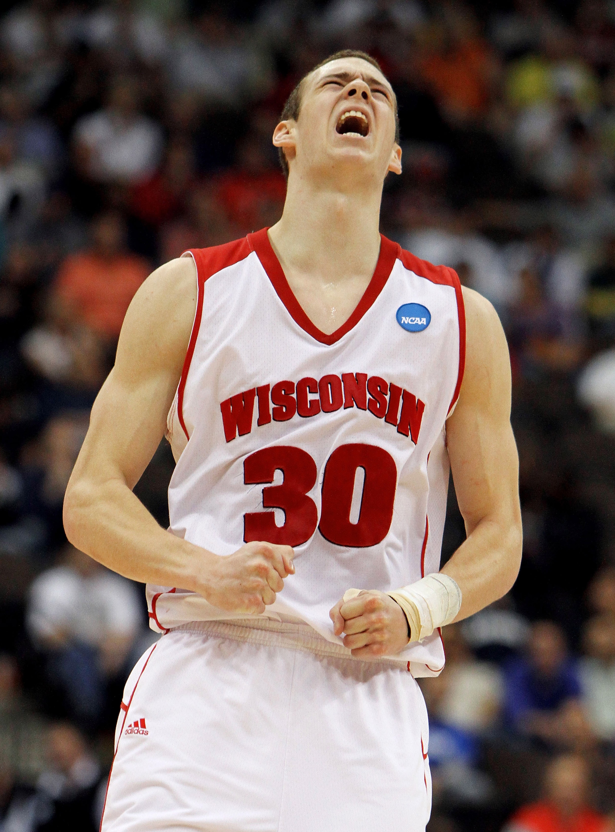 JACKSONVILLE, FL - MARCH 19:  Jon Leuer #30 of the Wisconsin Badgers celebrates after hitting a shot in the second half against the Wofford Terriers during the first round of the 2010 NCAA men's basketball tournament at Jacksonville Veteran's Memorial Are