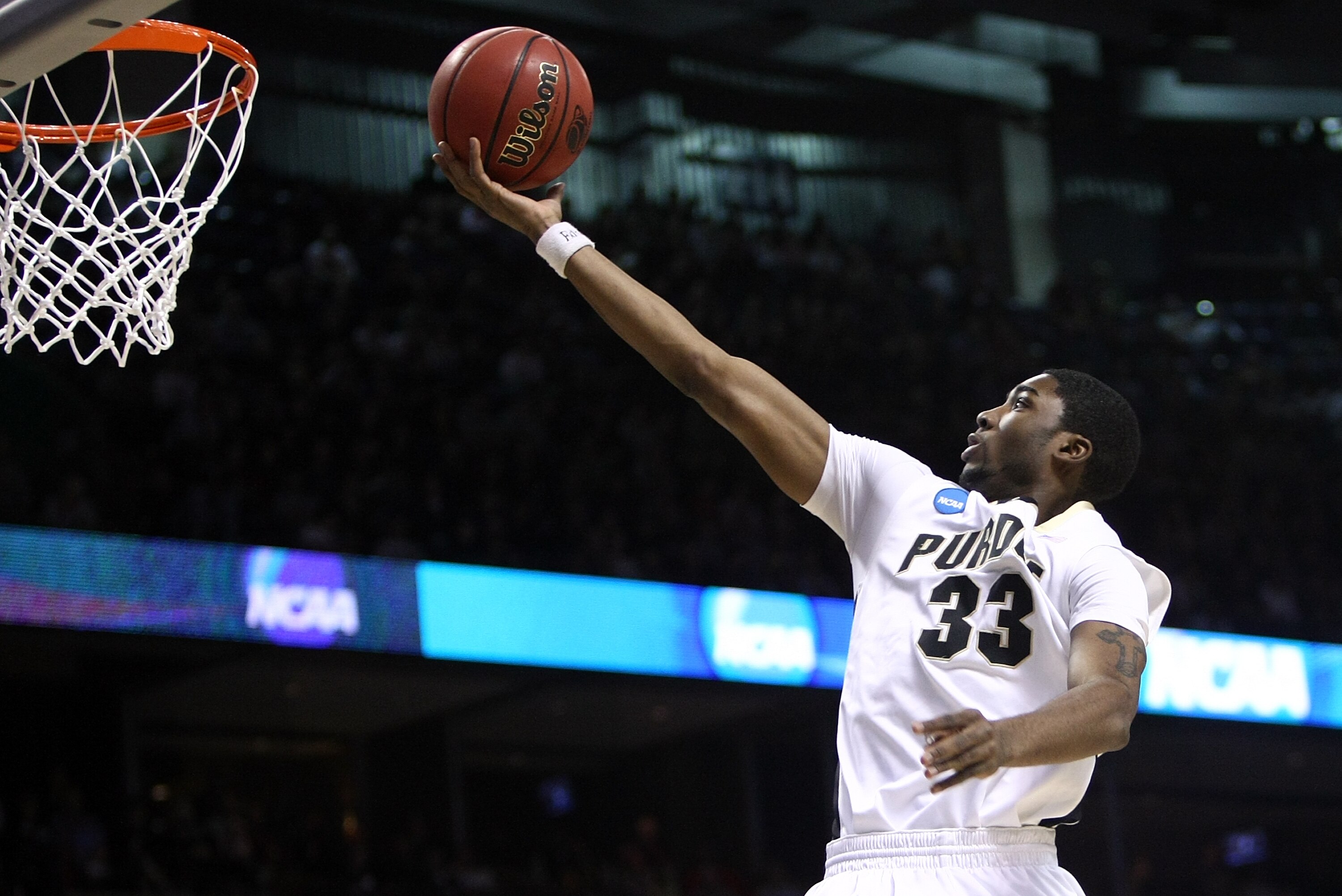 SPOKANE, WA - MARCH 21:  E'Twaun Moore #33 of the Purdue Boilermakers lays up the ball against the Texas A&M Aggies for the ball during the second round of the 2010 NCAA men's basketball tournament at Spokane Arena on March 21, 2010 in Spokane, Washington