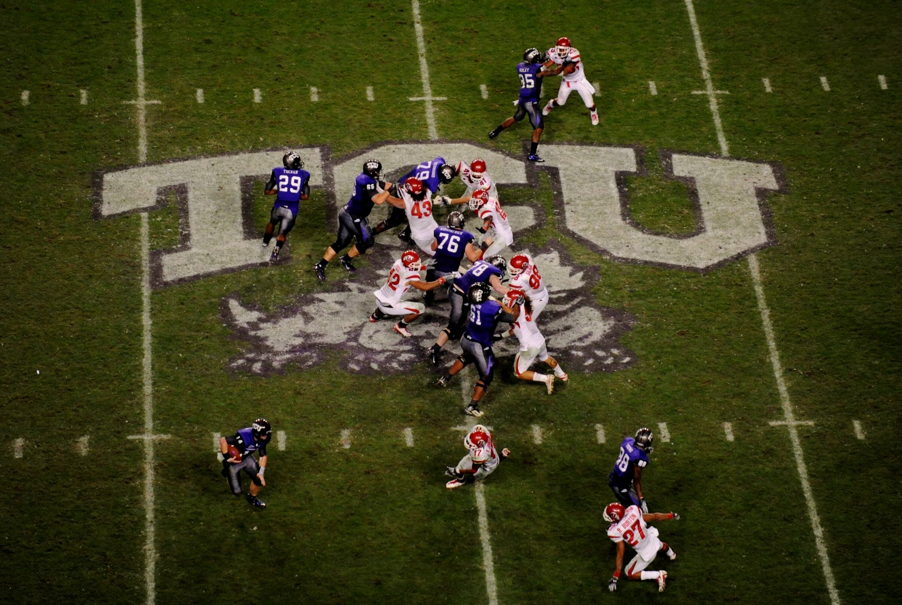 FORT WORTH, TX - NOVEMBER 14:  Quarterback Andy Dalton #14 of the TCU Horned Frogs runs with the ball against the Utah Utes in the game at Amon G. Carter Stadium on November 14, 2009 in Fort Worth, Texas.  TCU won the game 55-28. (Photo by Ronald Martinez
