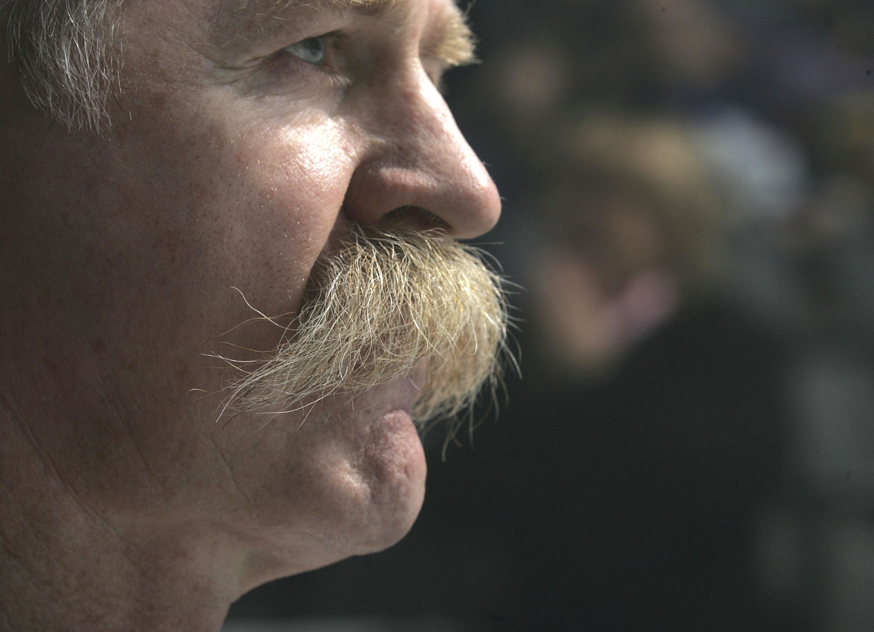TORONTO - NOVEMBER 12:  Lanny McDonald of Team Canada, sporting his famous mustache, pauses during introductions prior to his game against Team World during the Hockey Hall of Fame Legends Classic game at the Air Canada Centre November 12, 2006 in Toronto