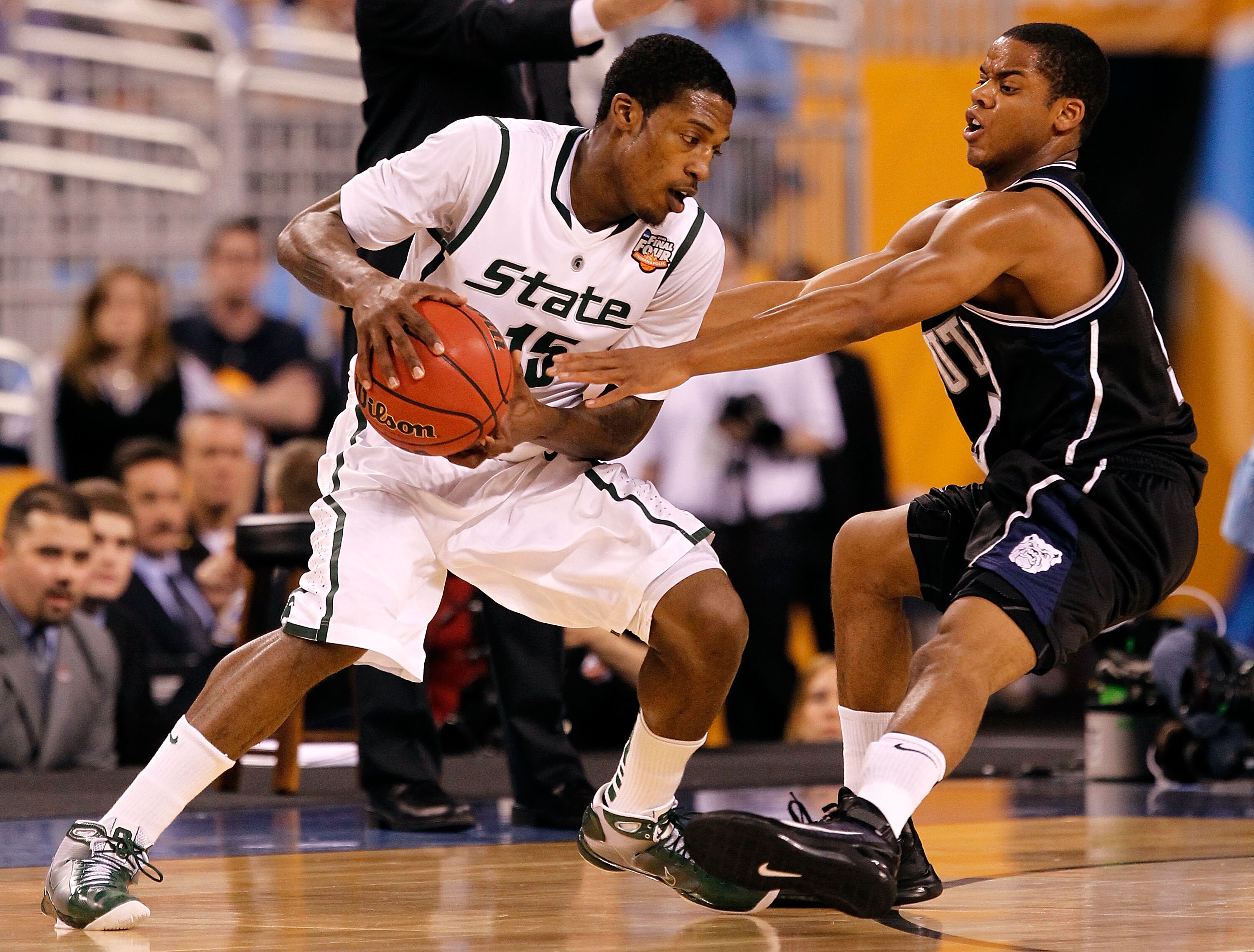 INDIANAPOLIS - APRIL 03:  Durrell Summers #15 of the Michigan State Spartans looks to drive against Ronald Nored #5 of the Butler Bulldogs during the National Semifinal game of the 2010 NCAA Division I Men's Basketball Championship on April 3, 2010 in Ind