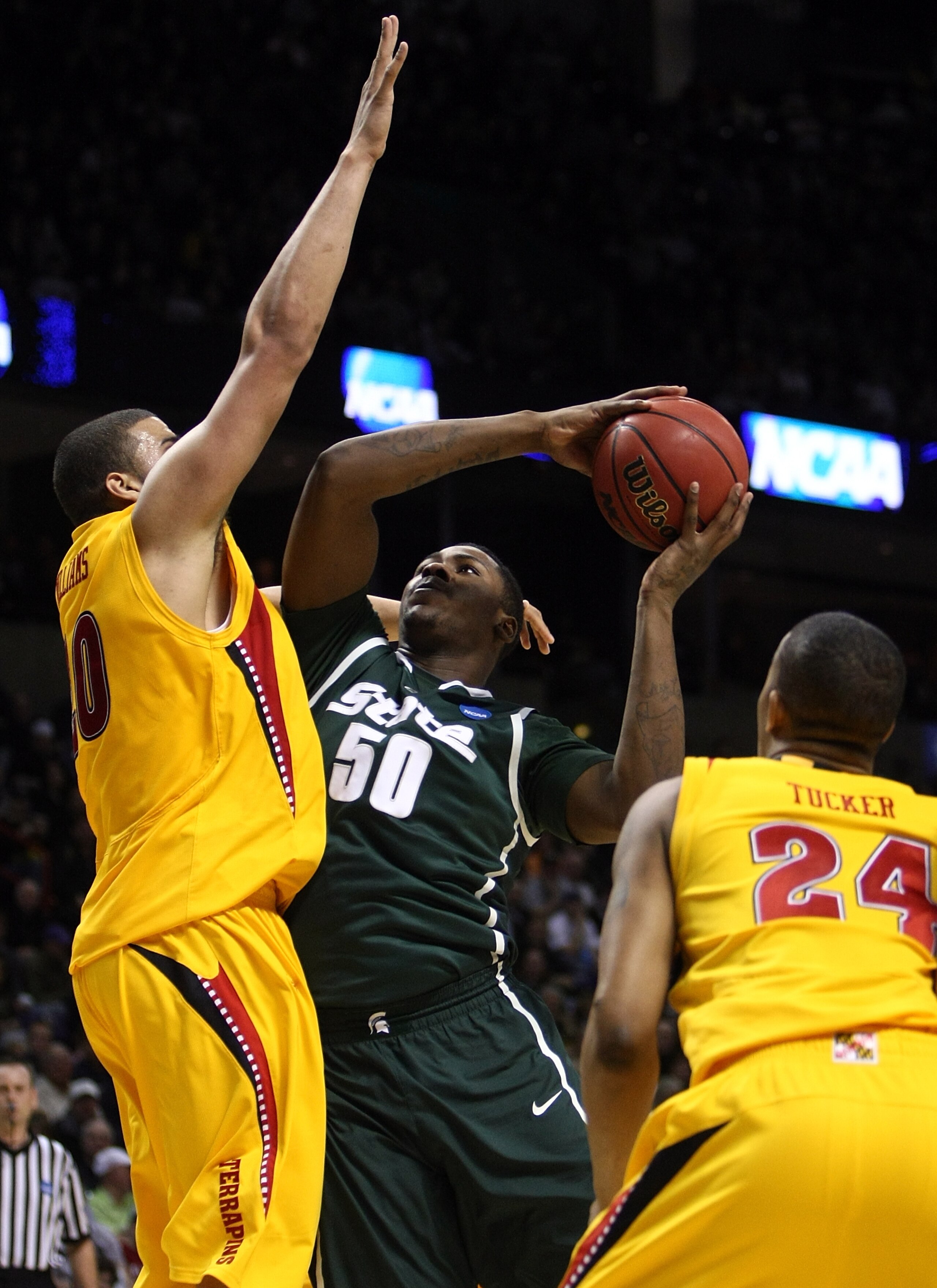 SPOKANE, WA - MARCH 21:  Derrick Nix #50 of the Michigan State Spartans shoots over Jordan Williams #20  of the Maryland Terrapins during the second round of the 2010 NCAA men's basketball tournament at Spokane Arena on March 21, 2010 in Spokane, Washingt
