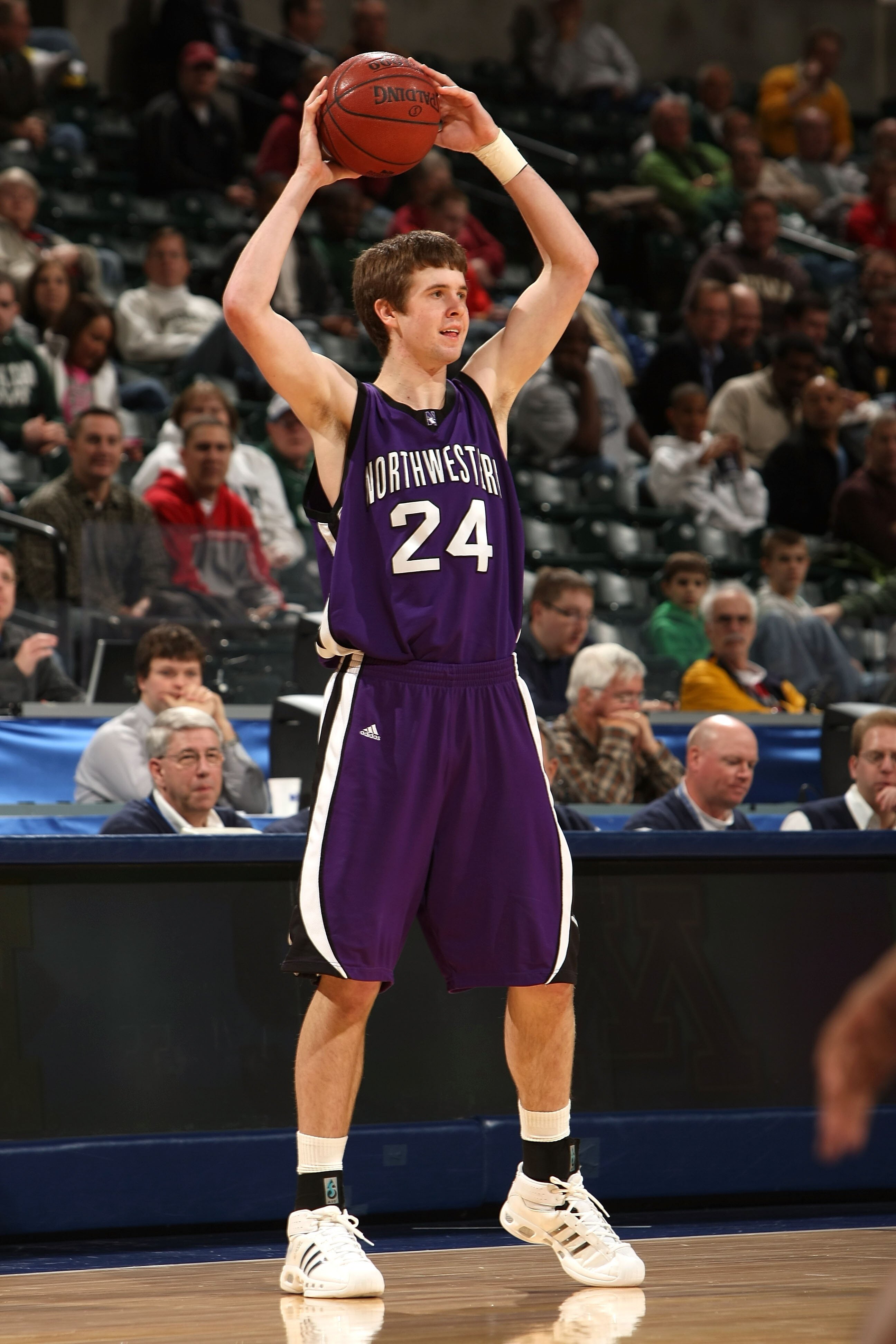 INDIANAPOLIS - MARCH 12:  John Shurna #24 of the Northwestern Wildcats looks to pass the ball against the Minnesota Golden Gophers during the first round of the Big Ten Men's Basketball Tournament at Conseco Fieldhouse on March 12, 2009 in Indianapolis, I