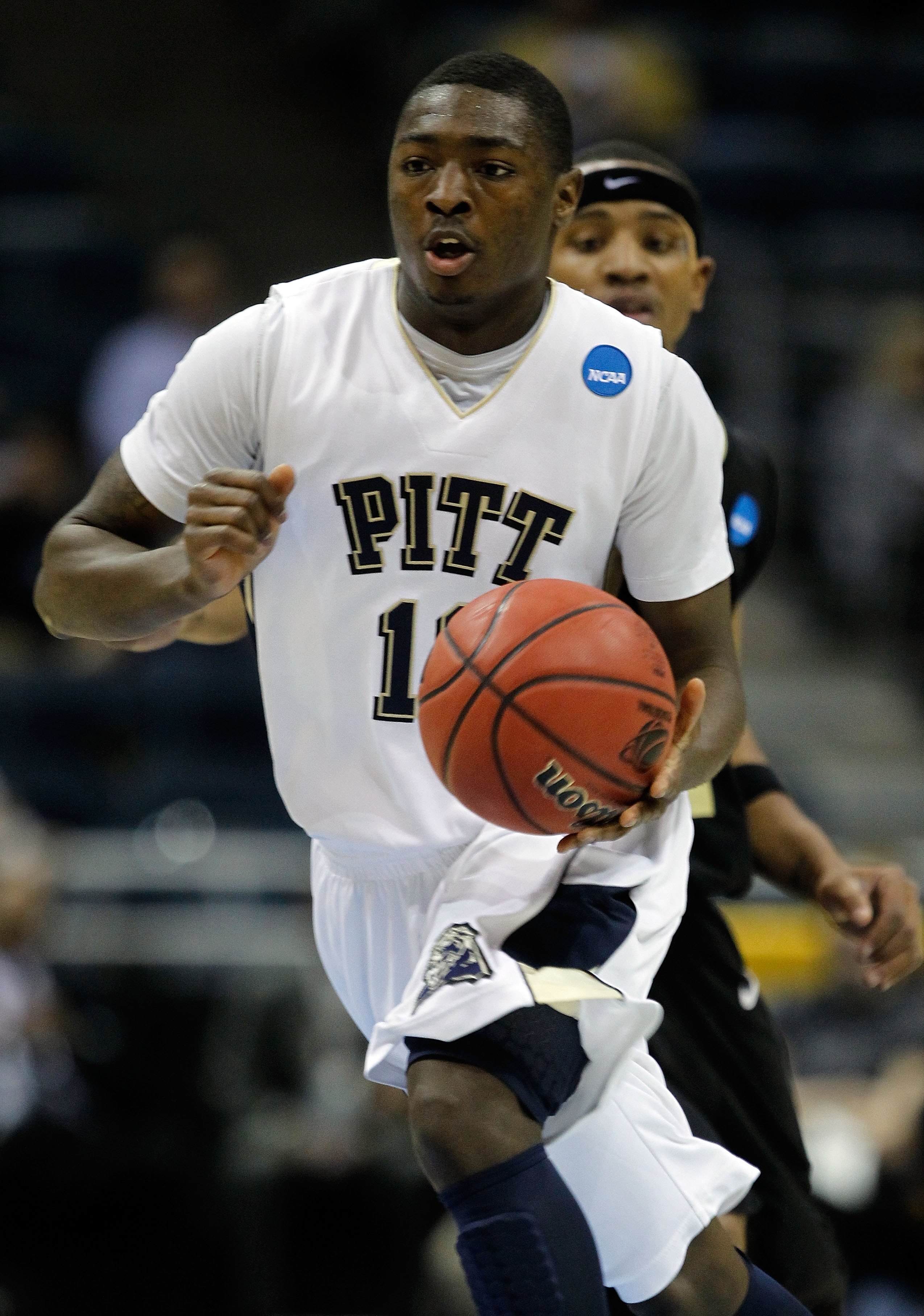 MILWAUKEE - MARCH 19:  Ashton Gibbs #12 of the Pittsburgh Panthers moves the ball while taking on the Oakland Golden Grizzlies during the first round of the 2010 NCAA men's basketball tournament at the Bradley Center on March 19, 2010 in Milwaukee, Wiscon