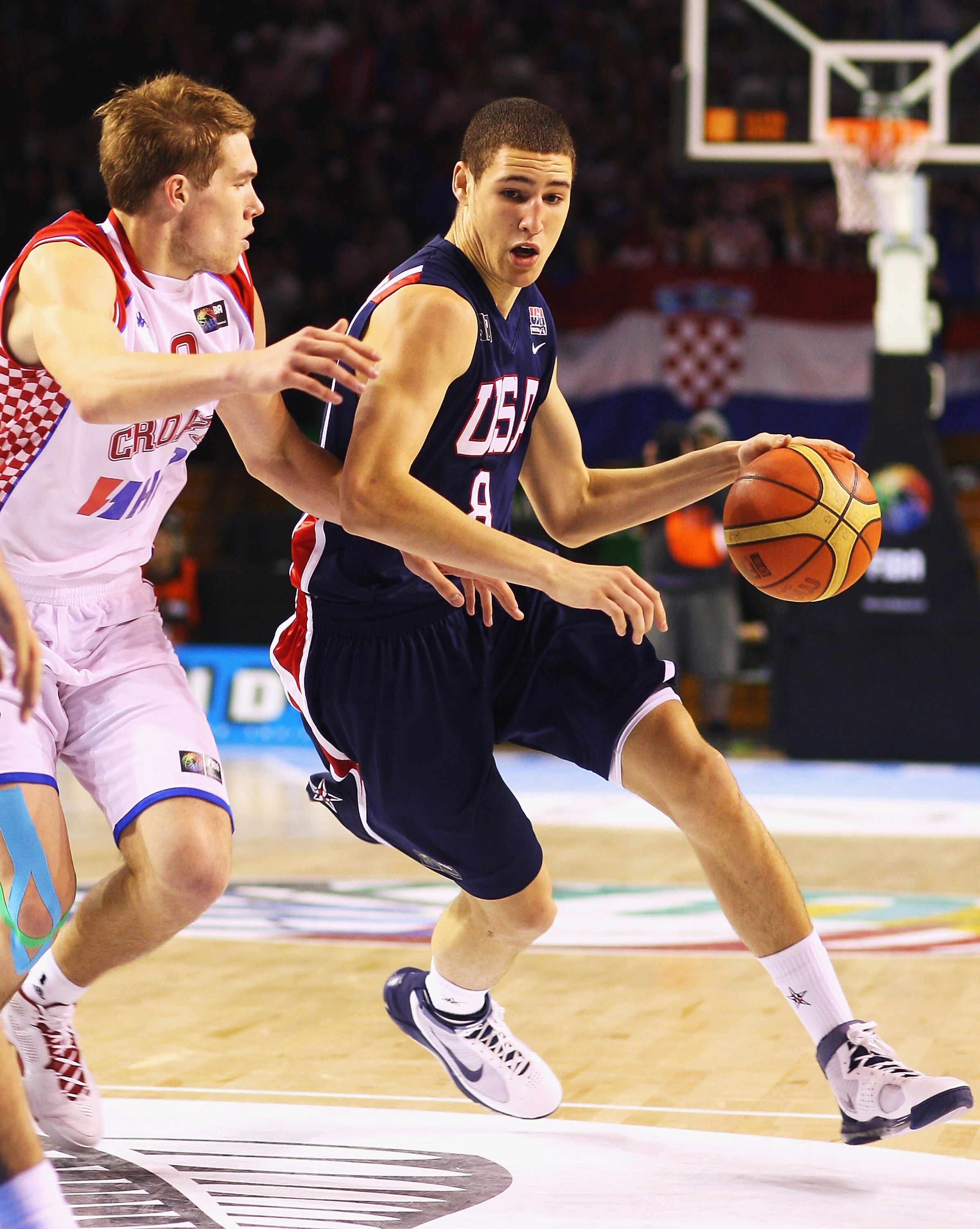 AUCKLAND, NEW ZEALAND - JULY 11:  Klay Thompson of the USA is put under pressure from Sime Olivari of Croatia during the U19 Basketball World Championships Semi-Final match between Croatia and the United States of America at North Shore Events Centre on J