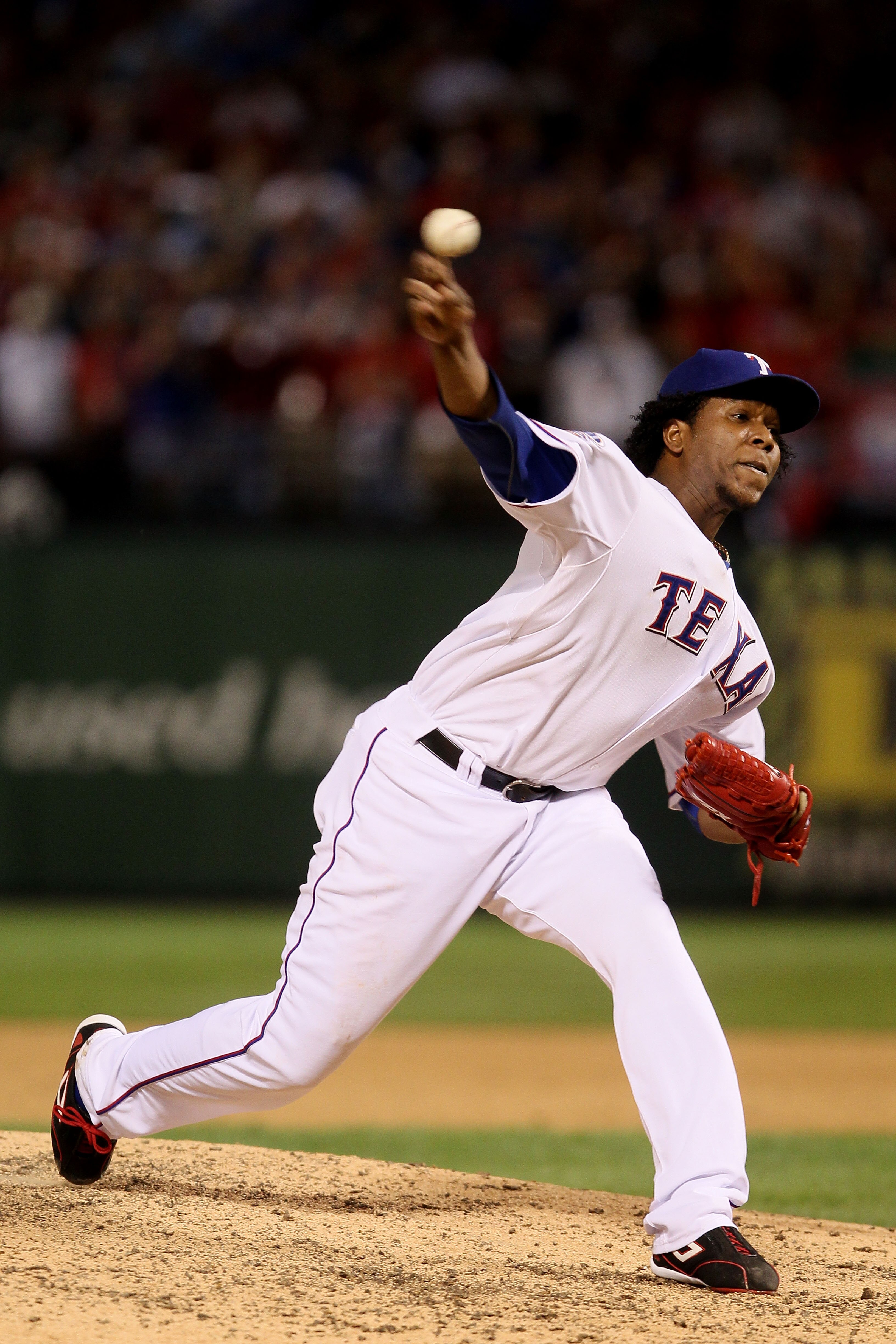ARLINGTON, TX - OCTOBER 30:  Neftali Feliz #30 of the Texas Rangers pitches against the San Francisco Giants in Game Three of the 2010 MLB World Series at Rangers Ballpark in Arlington on October 30, 2010 in Arlington, Texas.  (Photo by Elsa/Getty Images)
