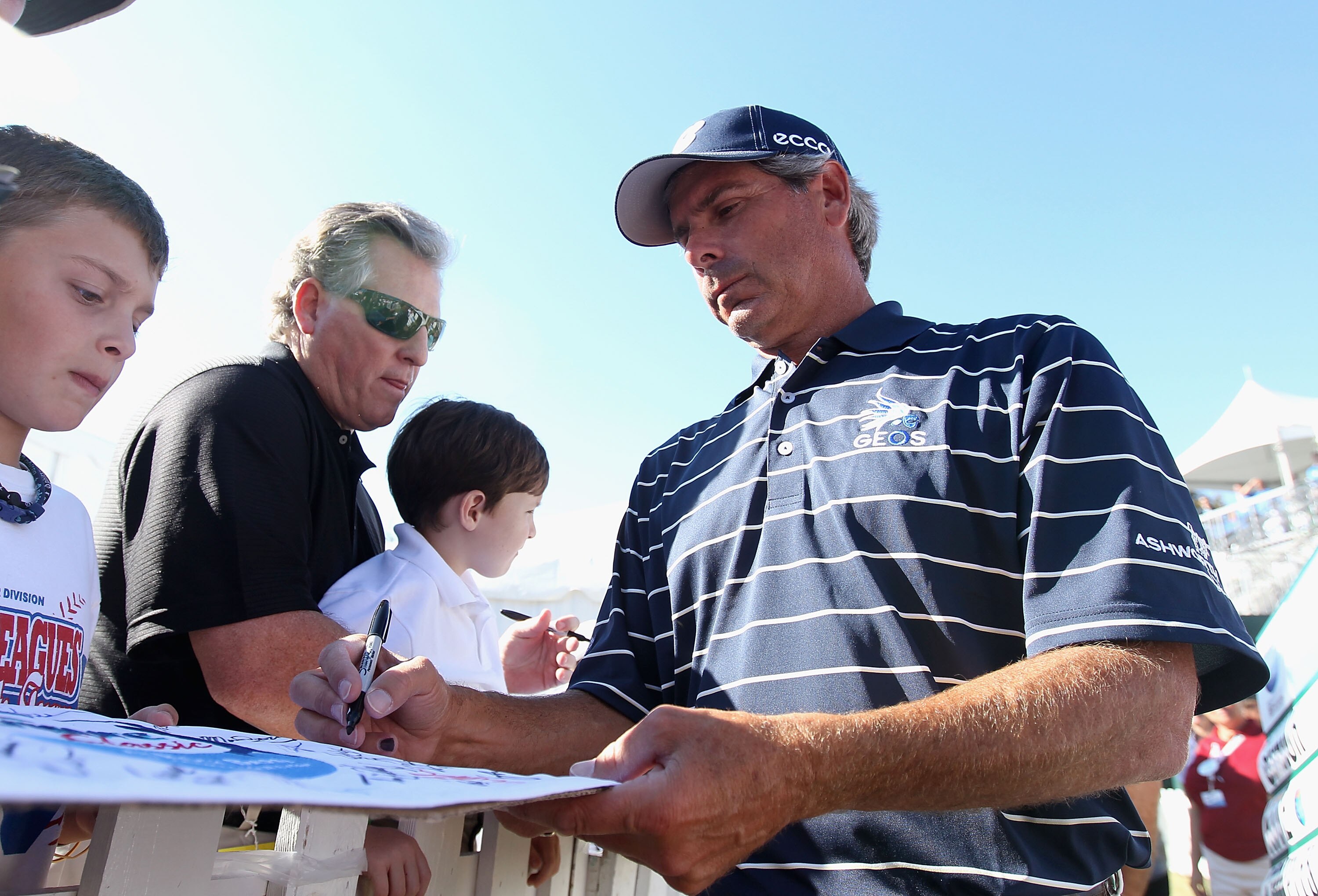 CONOVER, NC - OCTOBER 02:  Fred Couples signs autographs for fans following the second round of the Ensure Classic at the Rock Barn Golf & Spa on October 2, 2010 in Conover, North Carolina.  (Photo by Christian Petersen/Getty Images)