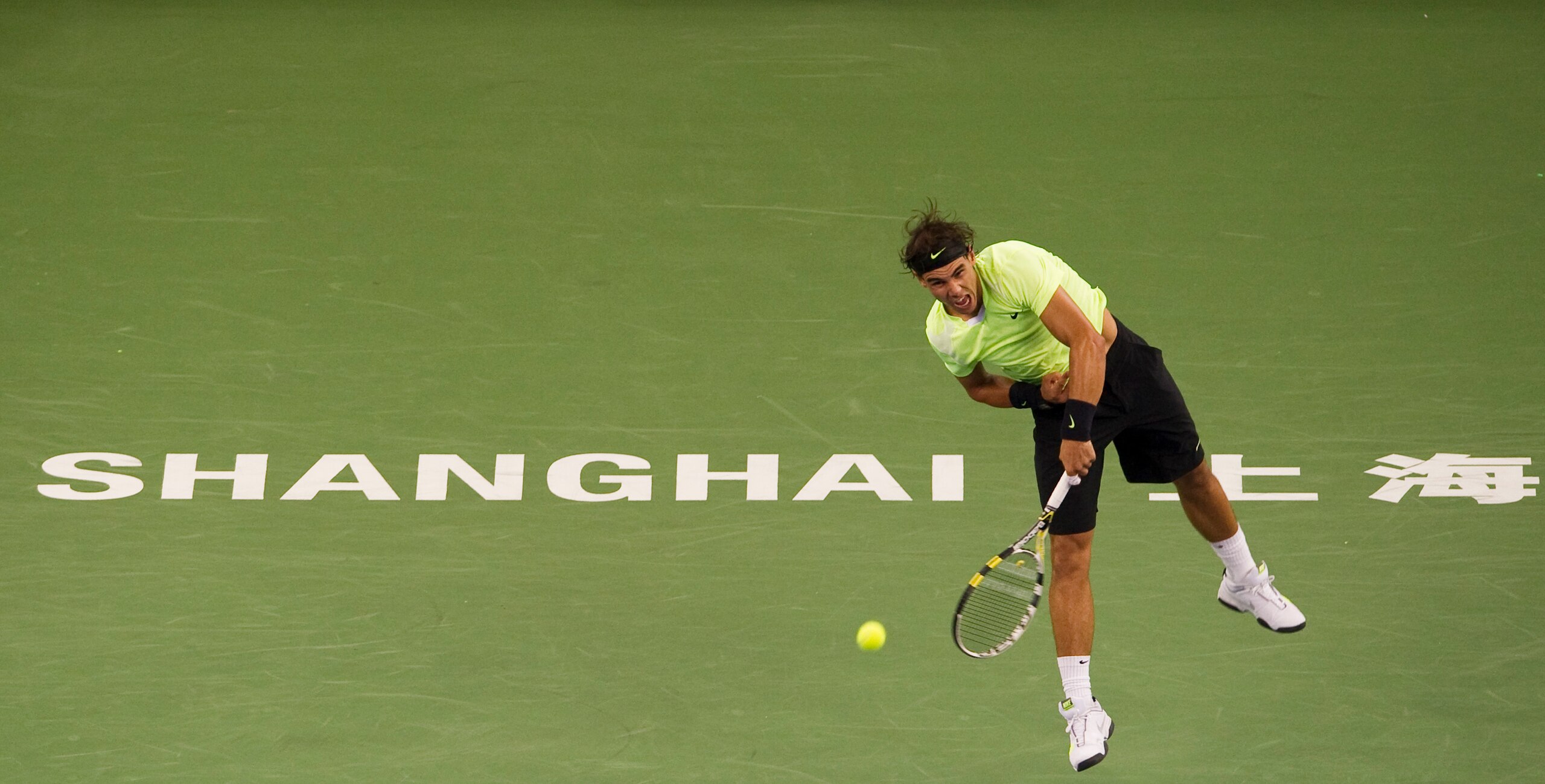 SHANGHAI, CHINA - OCTOBER 14: Rafael Nadal of Spain serves to Jurgen Melzer of Austria during day four of the 2010 Shanghai Rolex Masters at the Shanghai Qi Zhong Tennis Center on October 14, 2010 in Shanghai, China. (Photo by Victor Fraile/Getty Images SHANGHAI, CHINA - OCTOBER 14: Rafael Nadal of Spain serves to Jurgen Melzer of Austria during day four of the 2010 Shanghai Rolex Masters at the Shanghai Qi Zhong Tennis Center on October 14, 2010 in Shanghai, China. (Photo by Victor Fraile/Getty Images