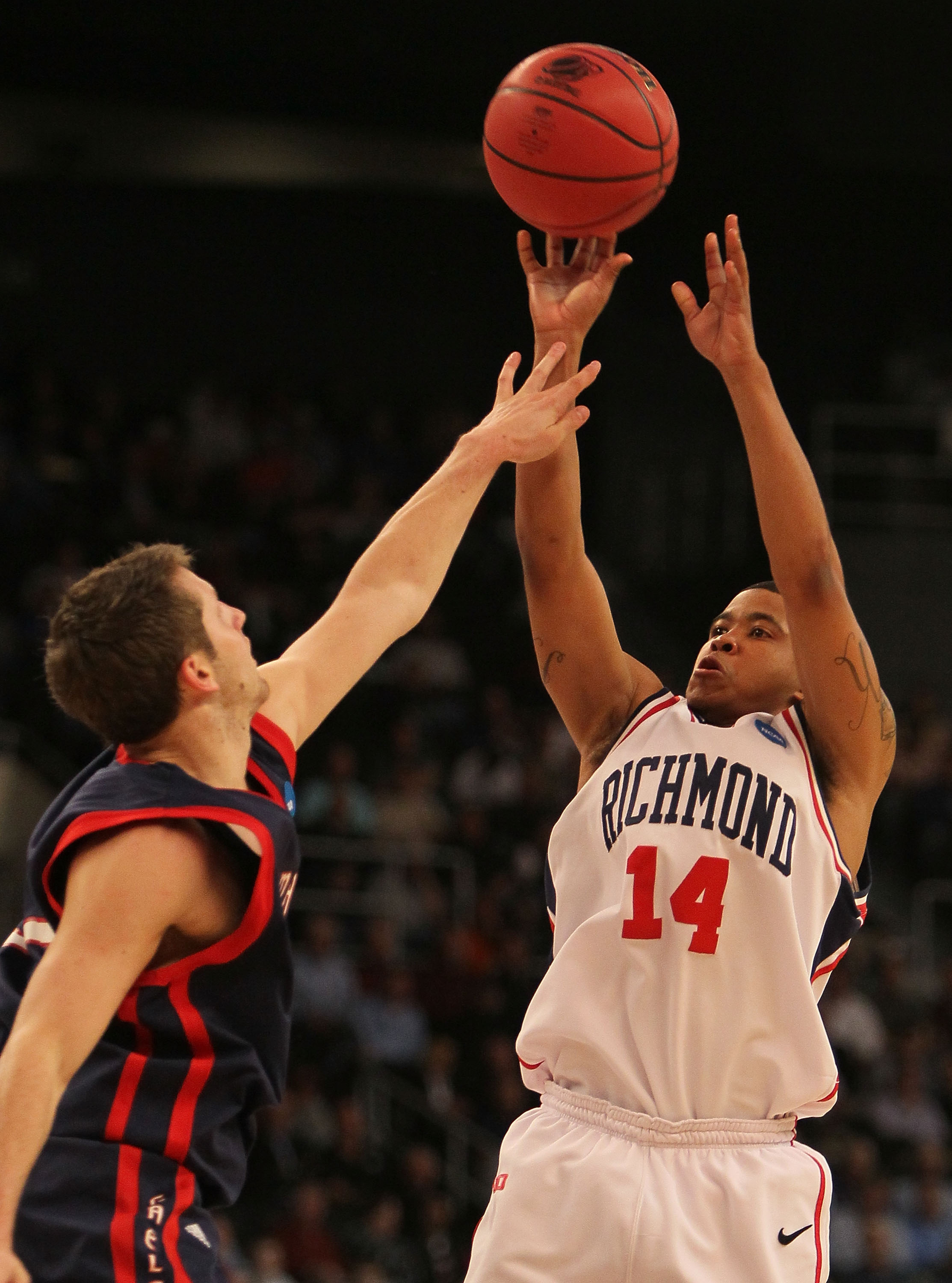PROVIDENCE, RI - MARCH 18: Kevin Anderson #14 of the Richmond Spiders shoots a basket against the Saint Mary's Gaels during the first round of the 2010 NCAA men's tournament at Dunkin' Donuts Center on March 18, 2010 in Providence, Rhode Island. (Jim Roga