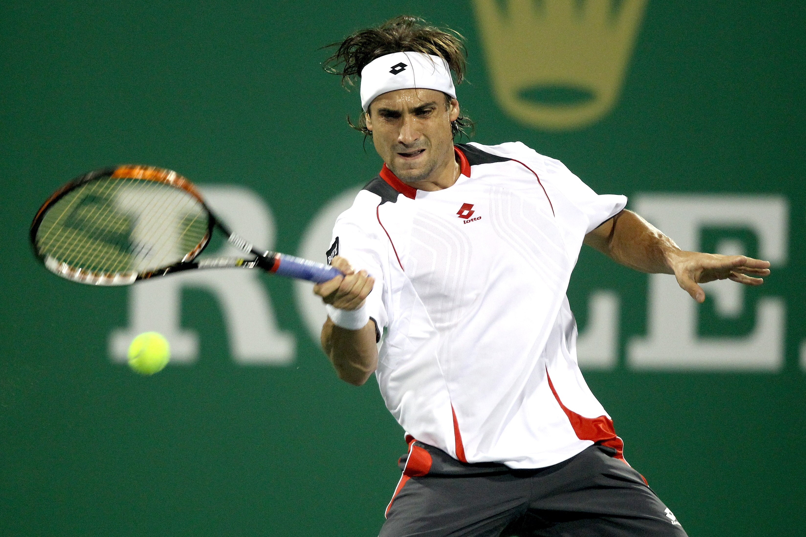SHANGHAI, CHINA - OCTOBER 14:  David Ferrer of Spain  returns a shot to Robin Soderling of Sweden during day four of the 2010 Shanghai Rolex Masters at the Shanghai Qi Zhong Tennis Center on October 13, 2010 in Shanghai, China.  (Photo by Matthew Stockman