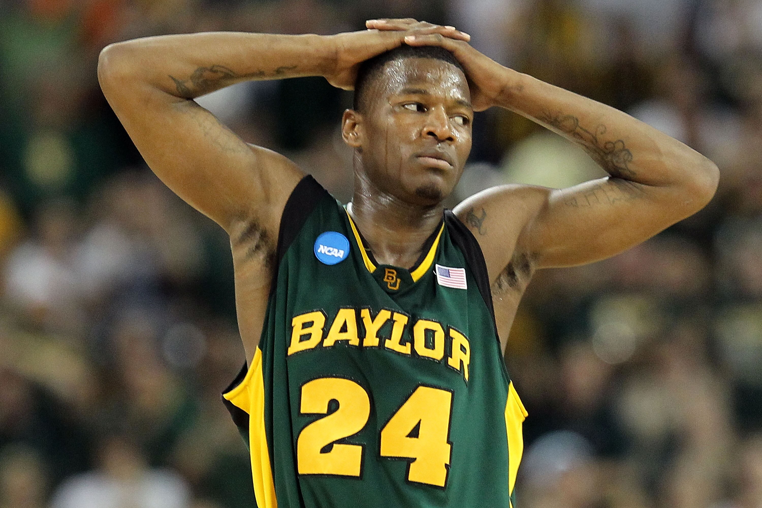 HOUSTON - MARCH 28: Guard LaceDarius Dunn #24 of the Baylor Bears reacts during a 78-71 loss against the Duke Blue Devils during the south regional final of the 2010 NCAA men's basketball tournament at Reliant Stadium on March 28, 2010 in Houston, Texas.