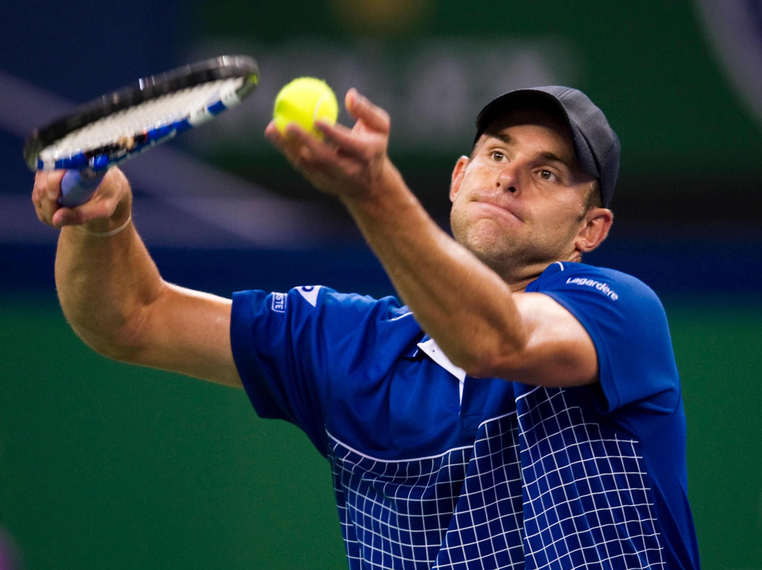 SHANGHAI, CHINA - OCTOBER 12: Andy Roddick of USA serves to Philipp Kohlschreiber of Germany during day two of the 2010 Shanghai Rolex Masters at the Shanghai Qi Zhong Tennis Center on October 12, 2010 in Shanghai, China. (Photo by Victor Fraile/Getty I SHANGHAI, CHINA - OCTOBER 12: Andy Roddick of USA serves to Philipp Kohlschreiber of Germany during day two of the 2010 Shanghai Rolex Masters at the Shanghai Qi Zhong Tennis Center on October 12, 2010 in Shanghai, China. (Photo by Victor Fraile/Getty I