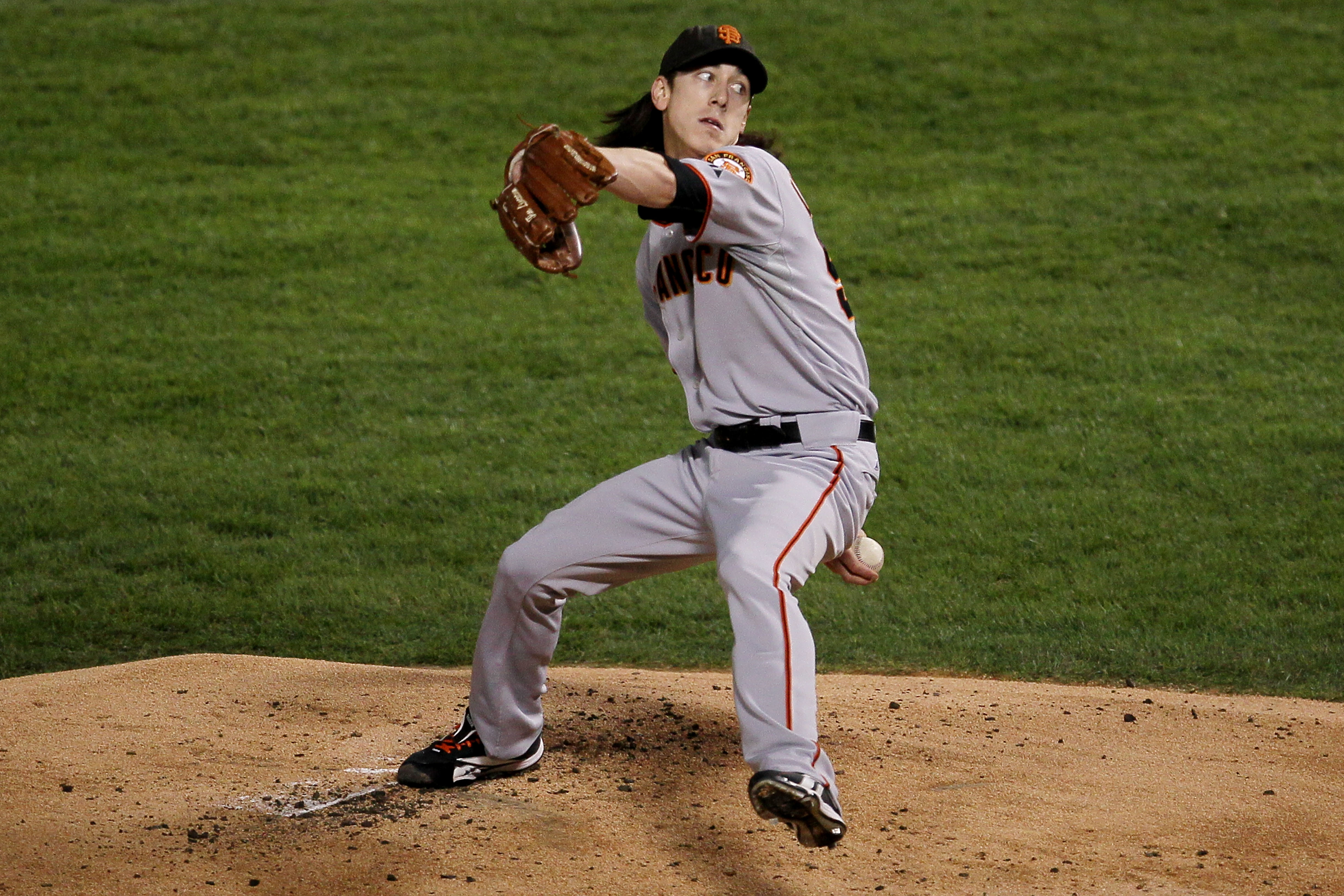 ARLINGTON, TX - NOVEMBER 01:  Starting pitcher Tim Lincecum #55 of the San Francisco Giants pitches against the Texas Rangers in Game Five of the 2010 MLB World Series at Rangers Ballpark in Arlington on November 1, 2010 in Arlington, Texas.  (Photo by St