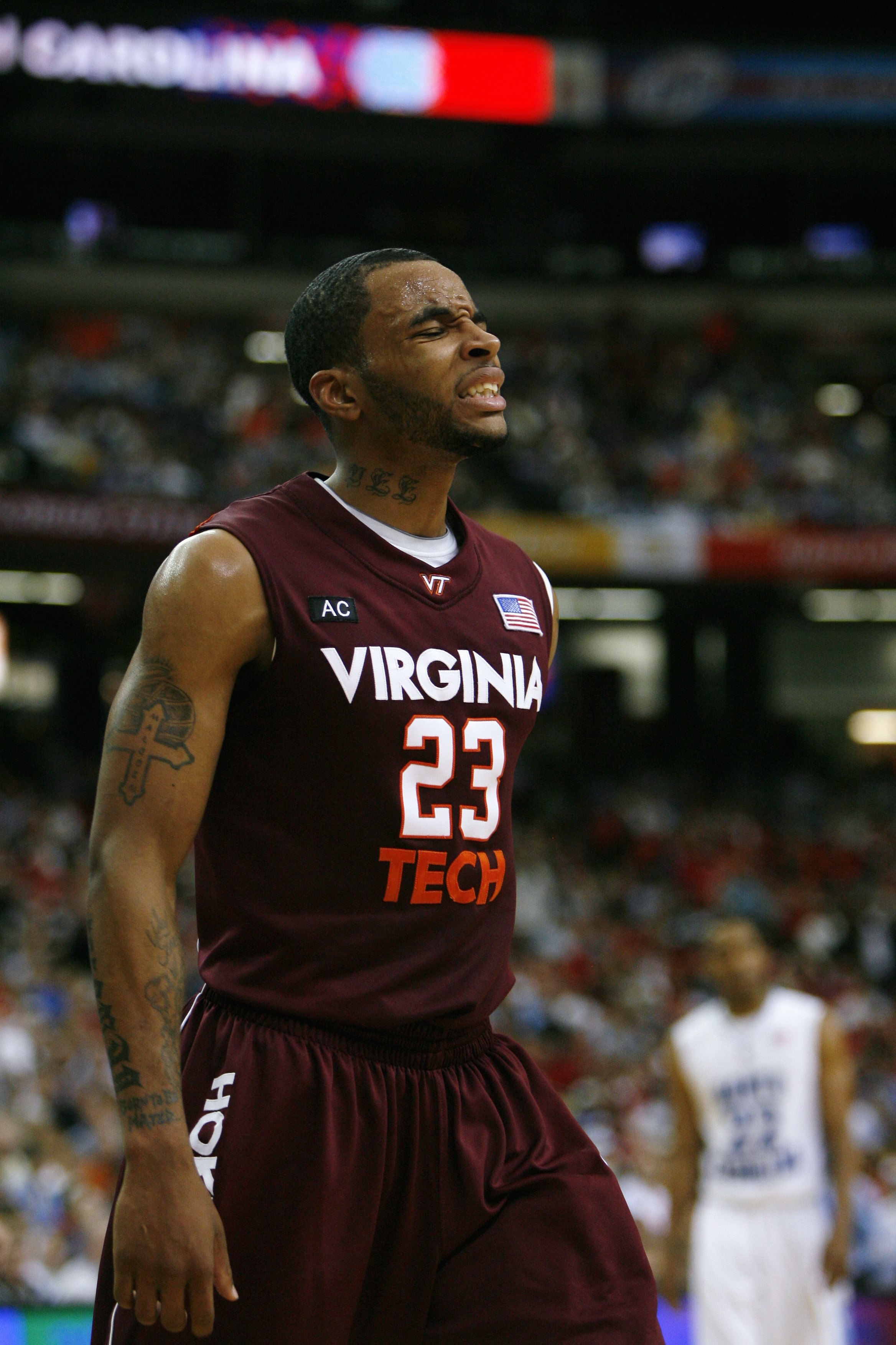 ATLANTA - MARCH 13:  Malcolm Delaney #23 of the Virginia Tech Hokies reacts to play against the North Carolina Tar Heels during day two of the 2009 ACC Men's Basketball Tournament on March 13, 2009 at the Georgia Dome in Atlanta, Georgia.  (Photo by Kevin