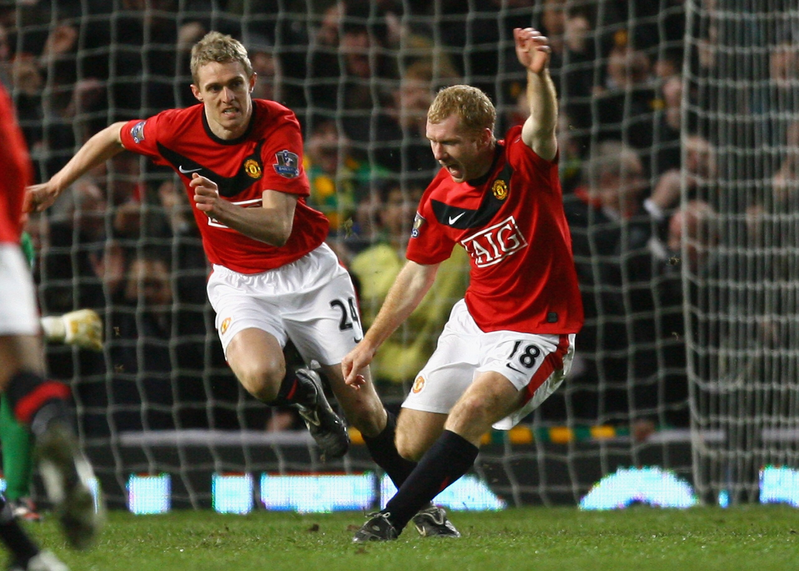 MANCHESTER, ENGLAND - JANUARY 27:  Paul Scholes of Manchester United celebrates scoring the opening goal during the Carling Cup Semi Final second leg match between Manchester United and Manchester City at Old Trafford on January 27, 2010 in Manchester, En
