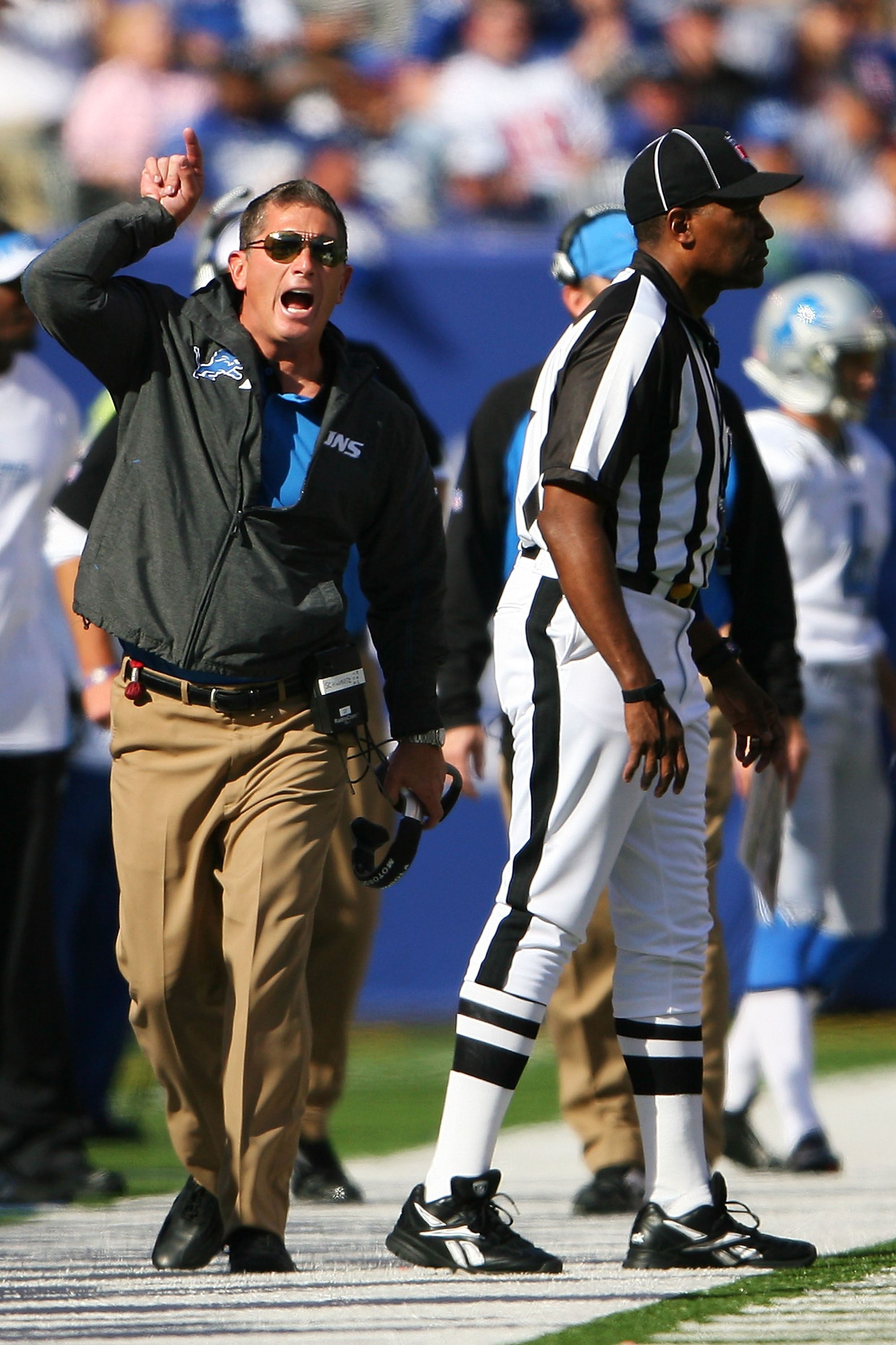 EAST RUTHERFORD, NJ - OCTOBER 17:  Jim Schwartz, head coach of the Detroit Lions screams after disagreeing with a referee call during a game against the New York Giants at New Meadowlands Stadium on October 17, 2010 in East Rutherford, New Jersey. The Gia