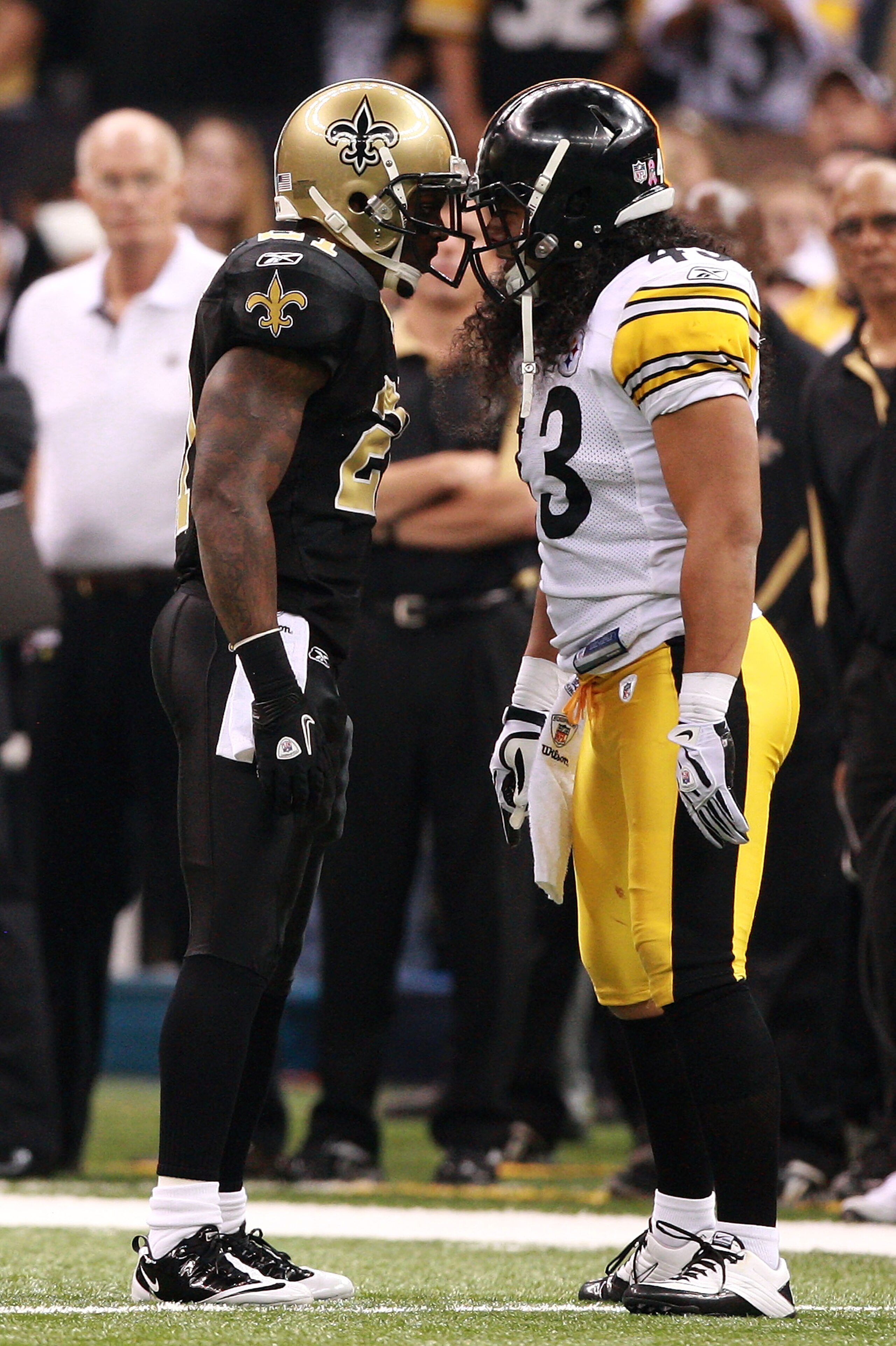 NEW ORLEANS - OCTOBER 31:  Julius Jones #21 of the New Orleans Saints and Troy Polamalu #43 of the Pittsburgh Steelers exchange words during their game at Louisiana Superdome on October 31, 2010 in New Orleans, Louisiana.  The Saints won 20-10 over the St