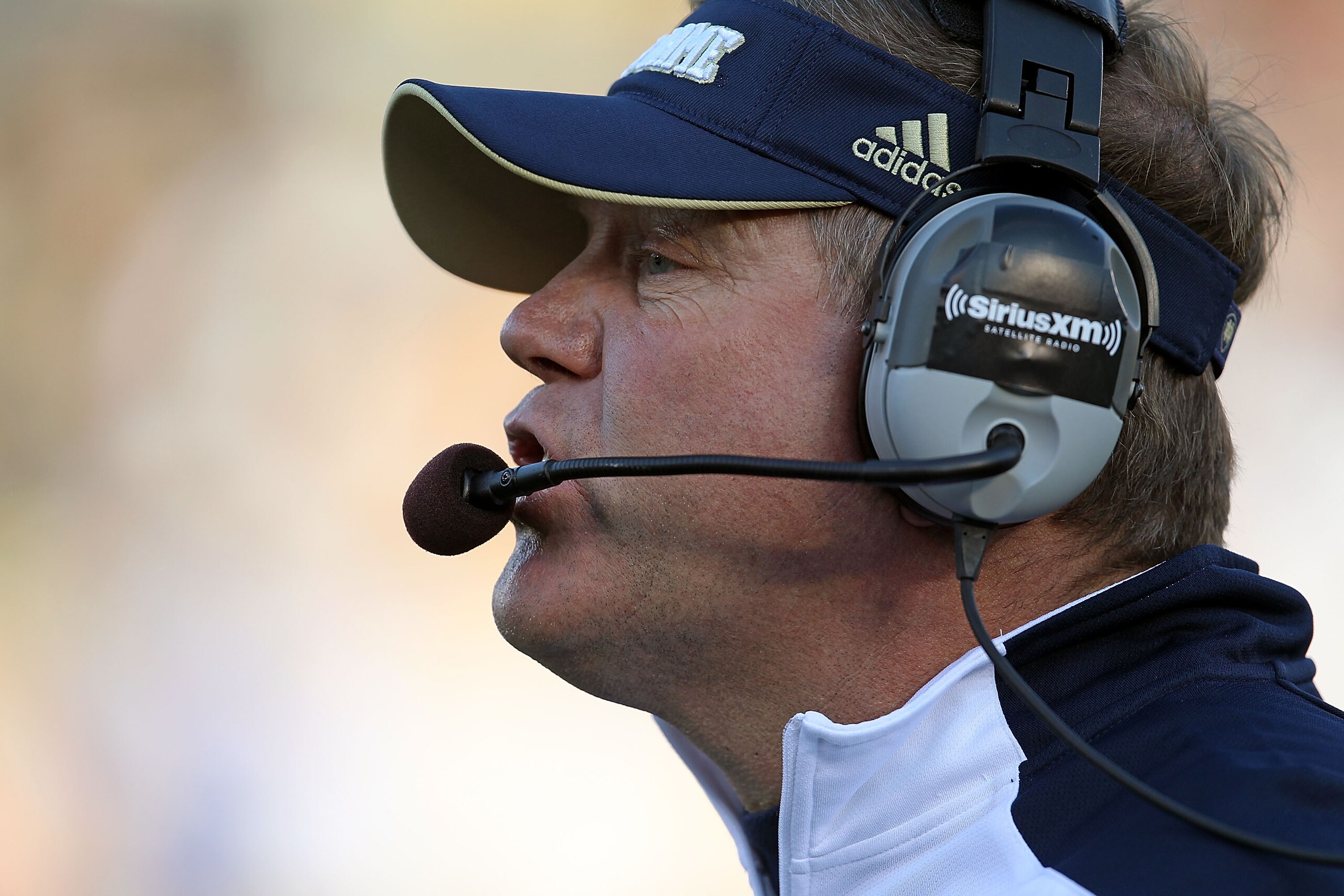 SOUTH BEND, IN - OCTOBER 30: Head coach Brian Kelly of the Notre Dame Fighting Irish watches as his team takes on the Tulsa Golden Hurricane at Notre Dame Stadium on October 30, 2010 in South Bend, Indiana. Tulsa defeated Notre Dame 28-27. (Photo by Jonat