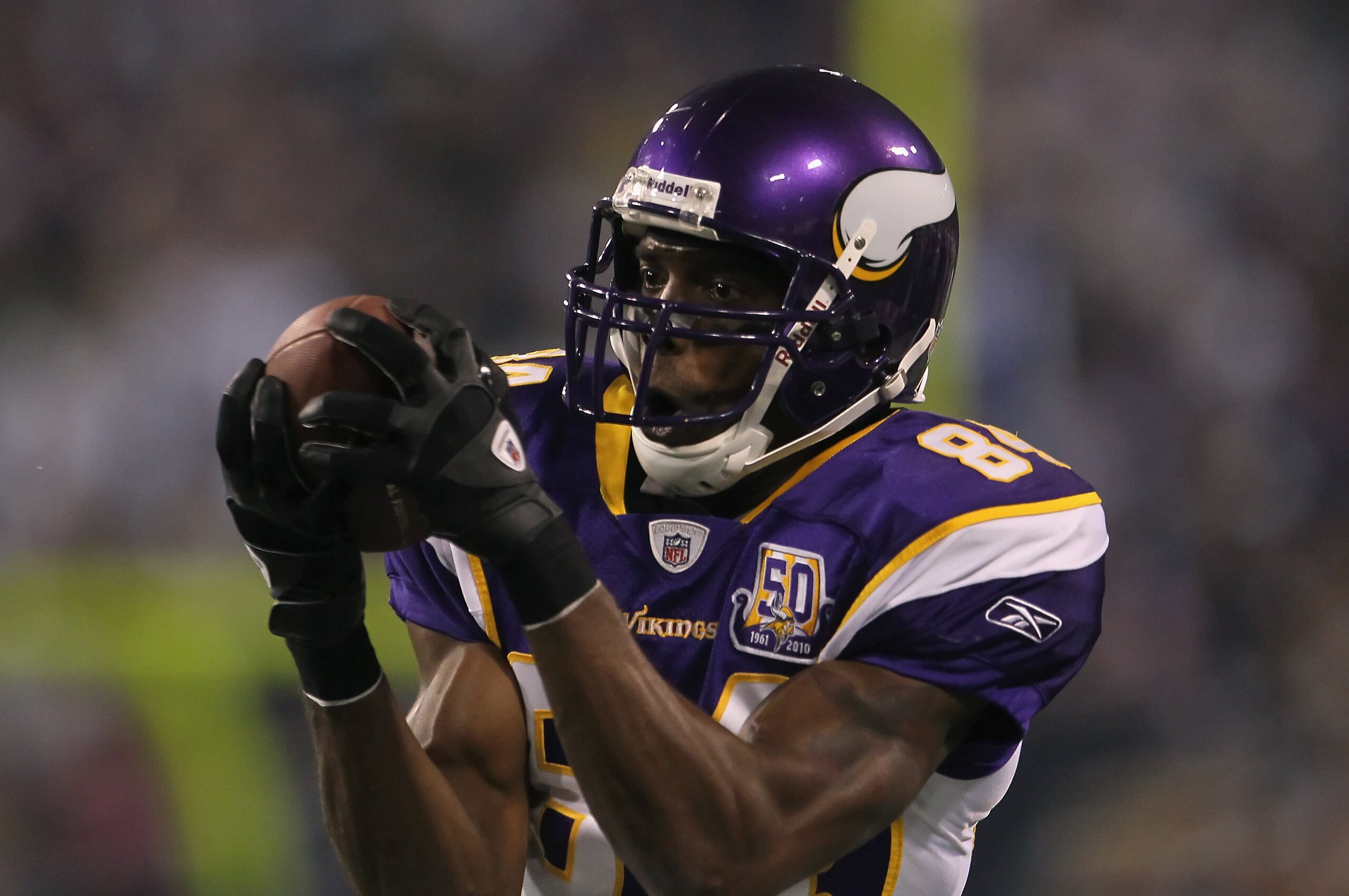 MINNEAPOLIS - OCTOBER 17:  Wide receiver Randy Moss #84 of the Minnesota Vikings catches a pass during the third quarter against the Dallas Cowboys at Mall of America Field on October 17, 2010 in Minneapolis, Minnesota. The Vikings defeated the Cowboys 24