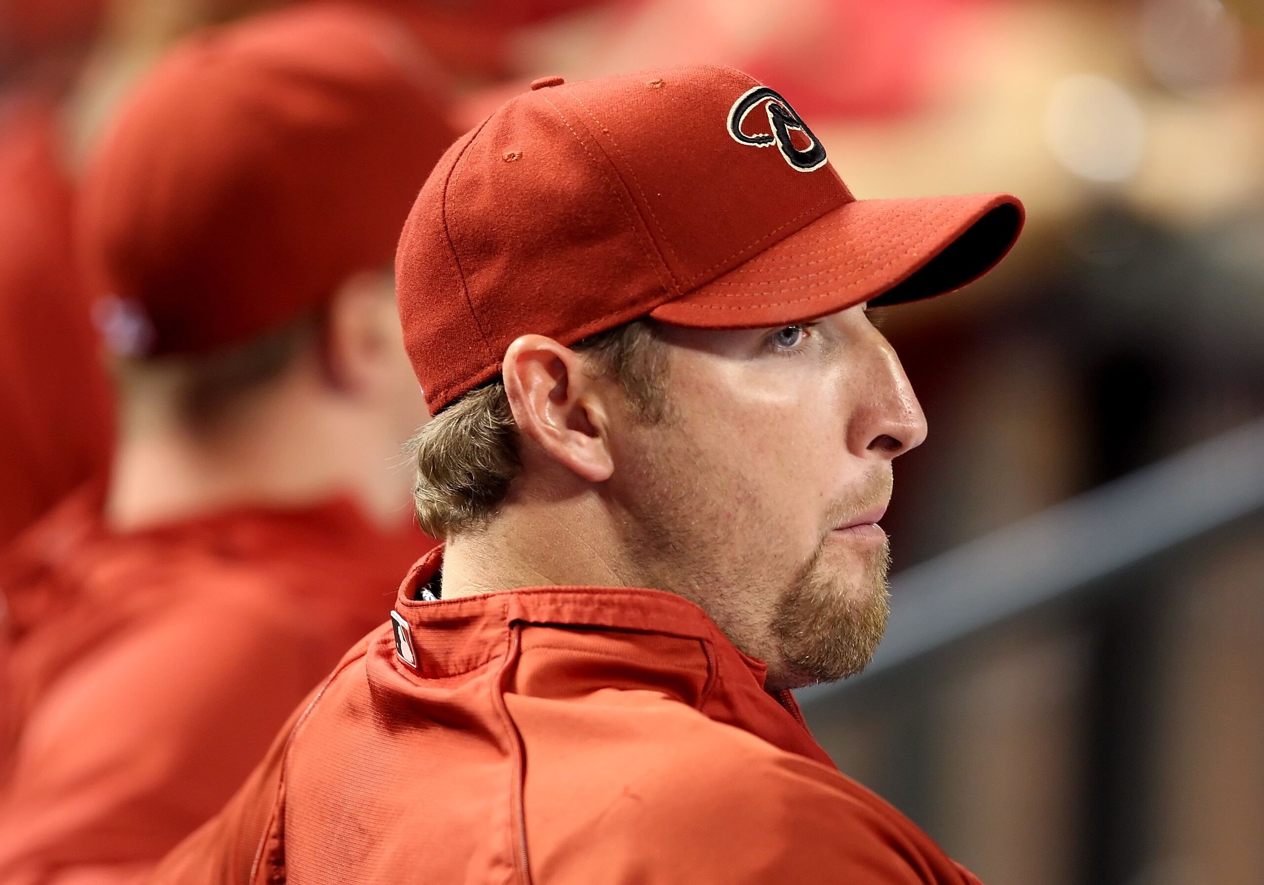 PHOENIX - APRIL 10: Pitcher Brandon Webb #17 of the Arizona Diamondbacks looks on during the game against the Los Angeles Dodgers at Chase Field on April 10, 2009 in Phoenix, Arizona. The Diamondbacks defeated the Dodgers 9-4. (Photo by Christian Peter PHOENIX - APRIL 10: Pitcher Brandon Webb #17 of the Arizona Diamondbacks looks on during the game against the Los Angeles Dodgers at Chase Field on April 10, 2009 in Phoenix, Arizona. The Diamondbacks defeated the Dodgers 9-4. (Photo by Christian Peter