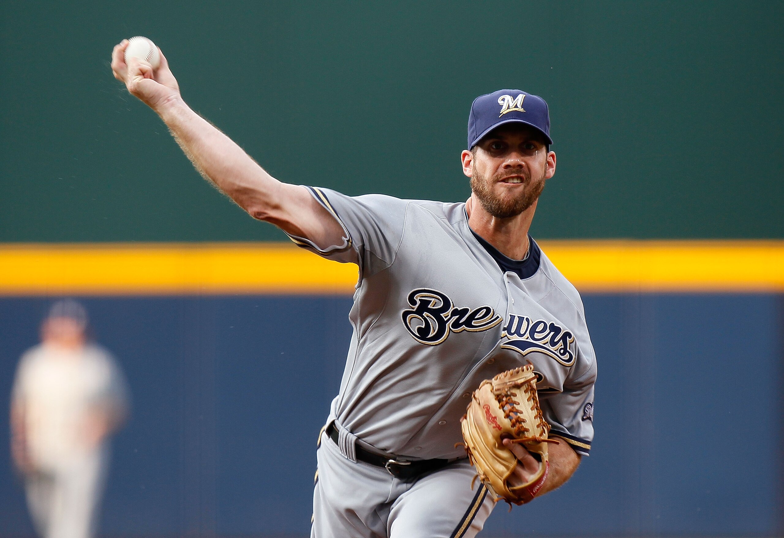 ATLANTA - JULY 15: Starting pitcher Dave Bush #31 of the Milwaukee Brewers pitches in the first inning against the Atlanta Braves at Turner Field on July 15, 2010 in Atlanta, Georgia. (Photo by Kevin C. Cox/Getty Images) ATLANTA - JULY 15: Starting pitcher Dave Bush #31 of the Milwaukee Brewers pitches in the first inning against the Atlanta Braves at Turner Field on July 15, 2010 in Atlanta, Georgia. (Photo by Kevin C. Cox/Getty Images)