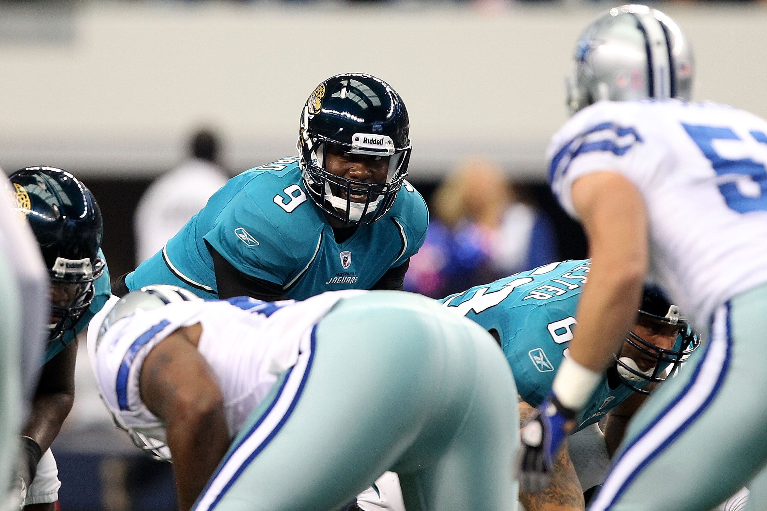 ARLINGTON, TX - OCTOBER 31:  Quarterback David Garrad #9 of the Jacksonville Jaguars calls signals out at the line of scrimmage against the Dallas Cowboys at Cowboys Stadium on October 31, 2010 in Arlington, Texas.  (Photo by Chris Chambers/Getty Images)